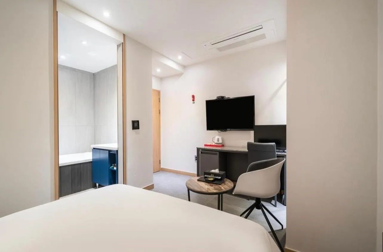 Bed in HOTEL MYEONG JAK