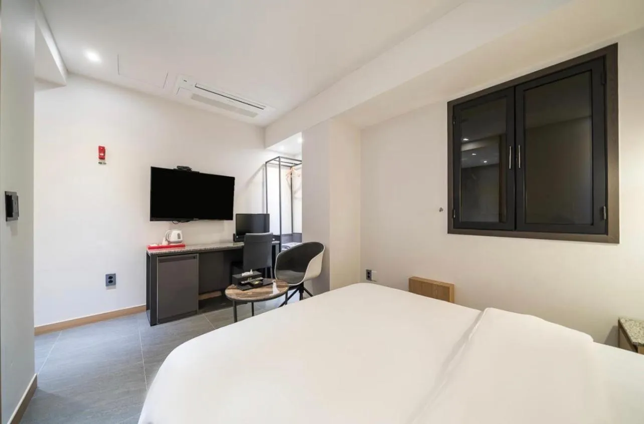 Bed in HOTEL MYEONG JAK