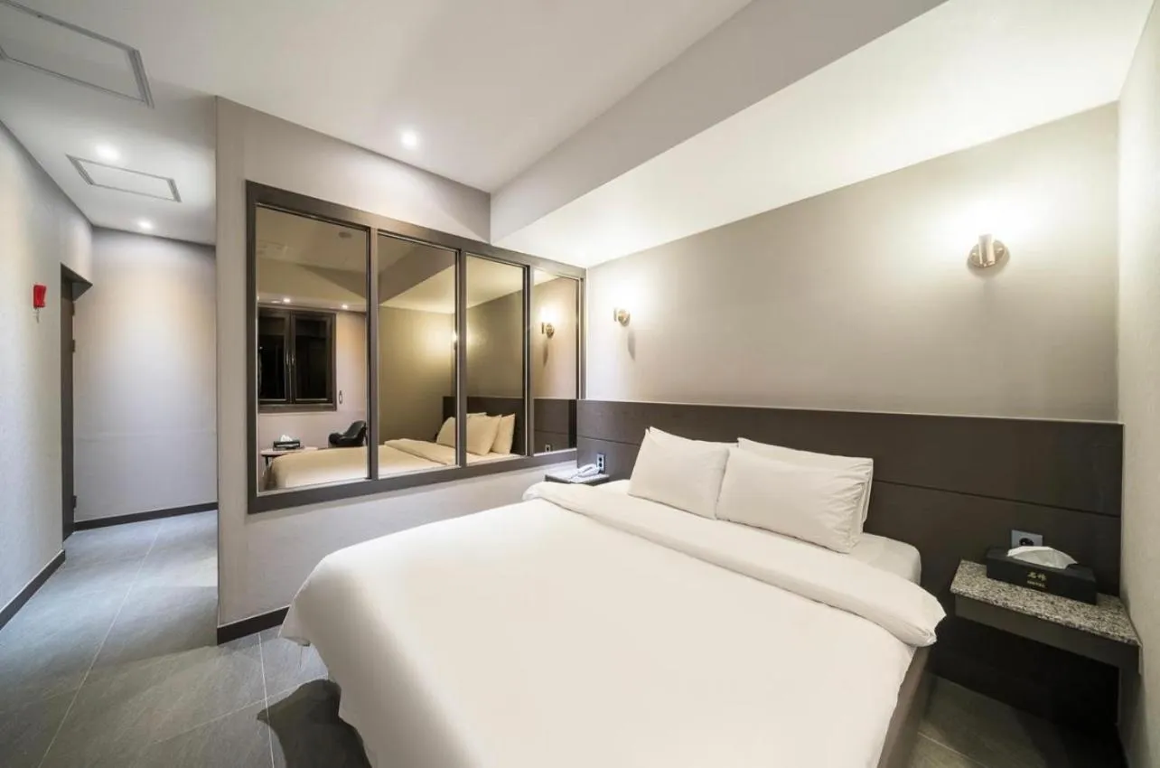 Bed in HOTEL MYEONG JAK