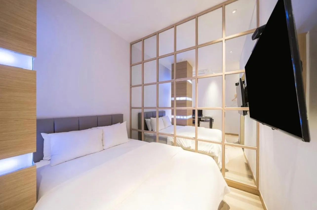 Bed in HOTEL MYEONG JAK