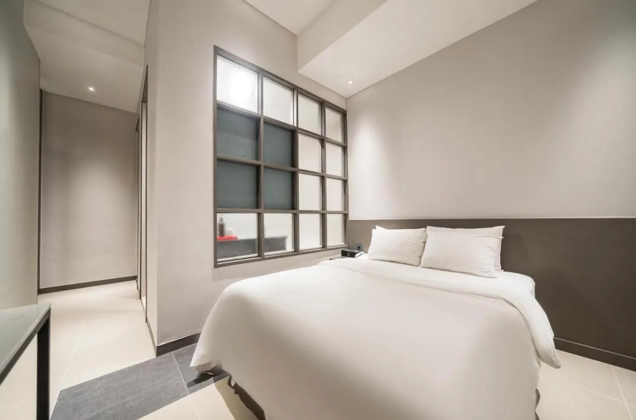 Bed in HOTEL MYEONG JAK