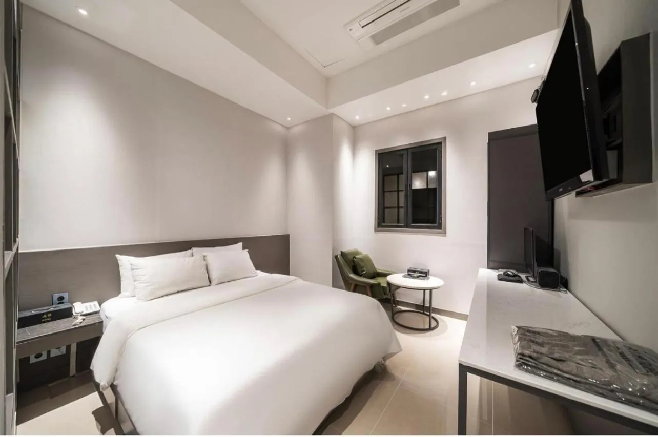 Bed in HOTEL MYEONG JAK