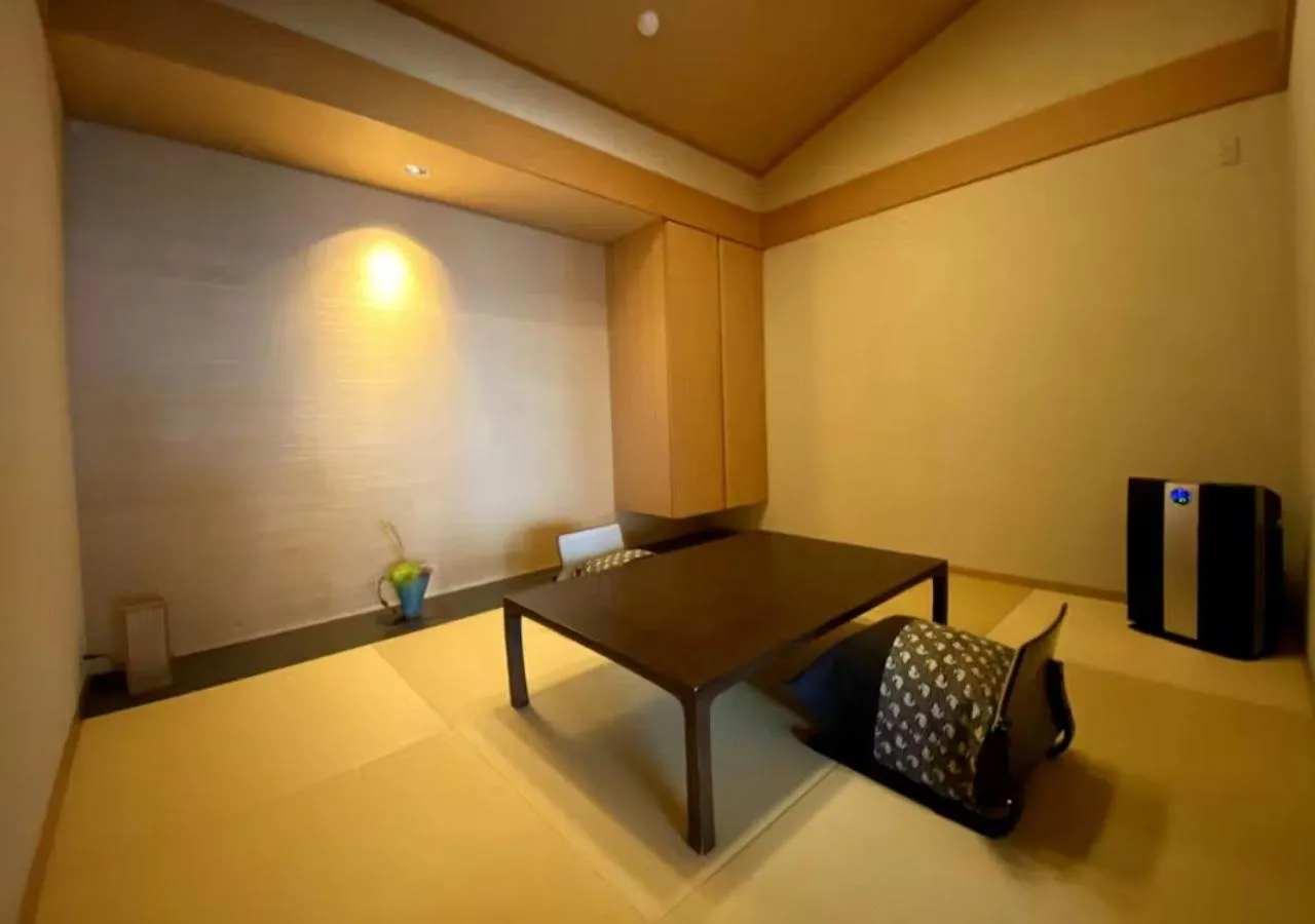 Photo of the whole room, Bed in Oyado The Earth