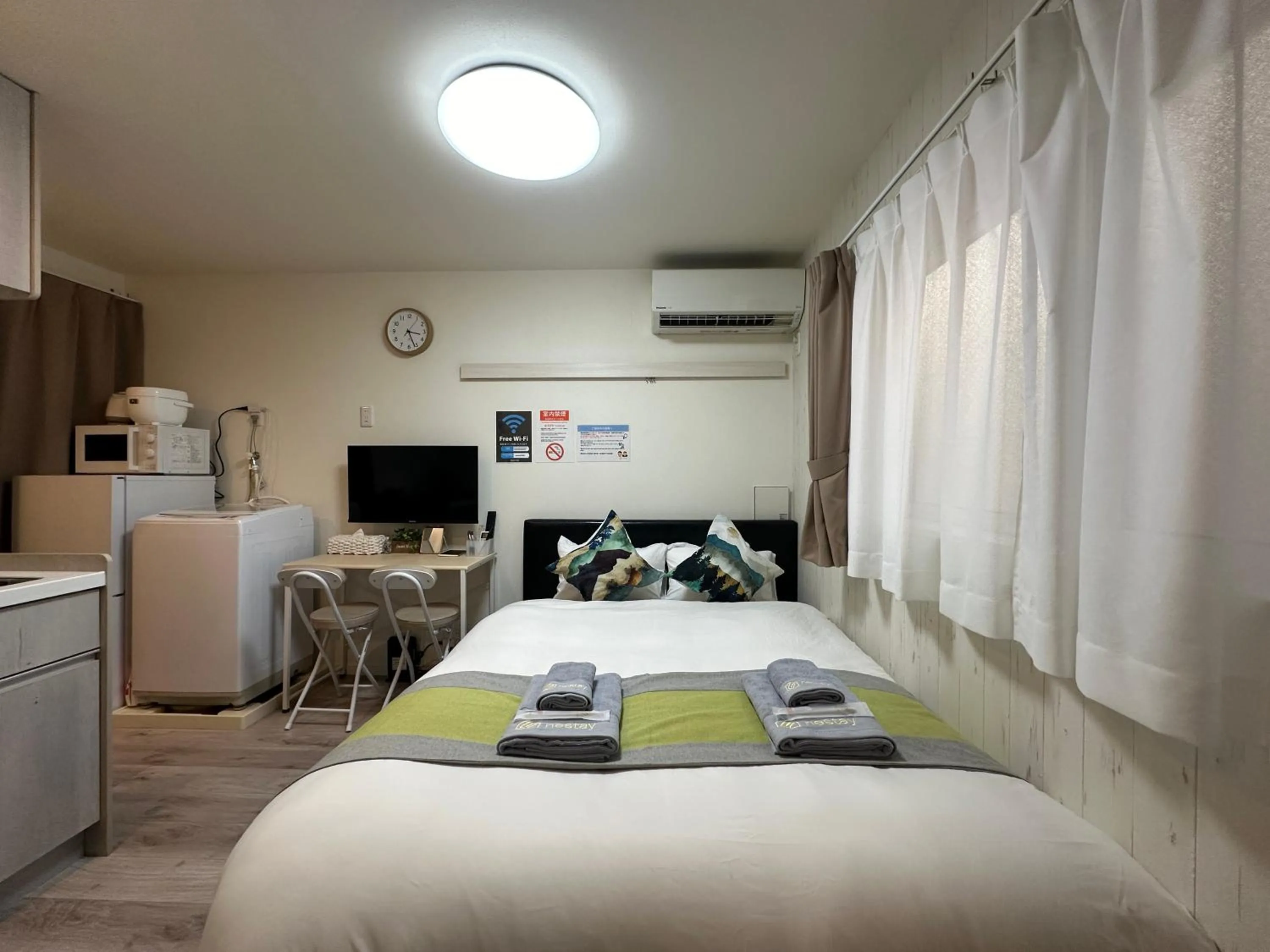 Bed in nestay apartment tokyo waseda