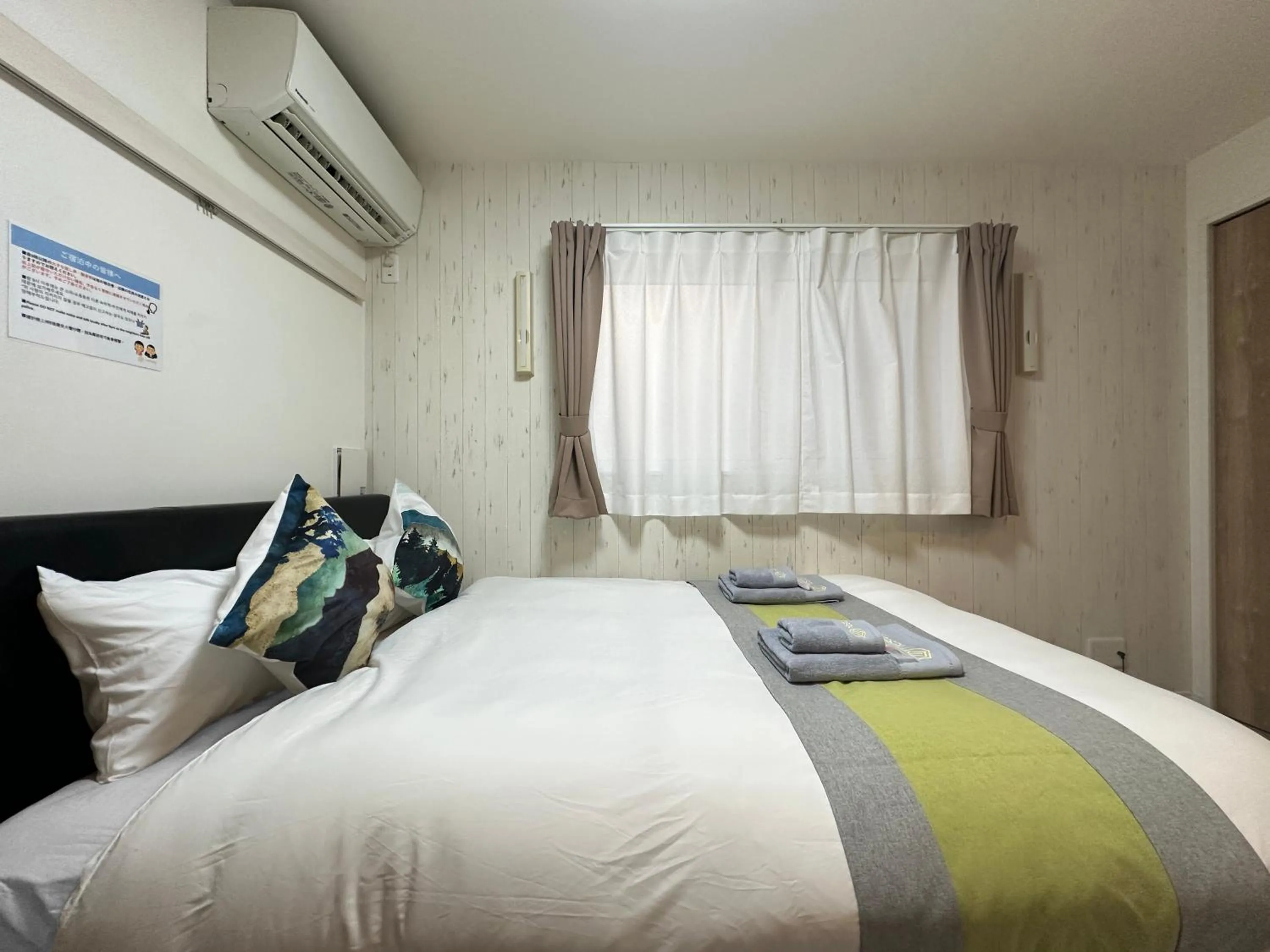 Bed in nestay apartment tokyo waseda