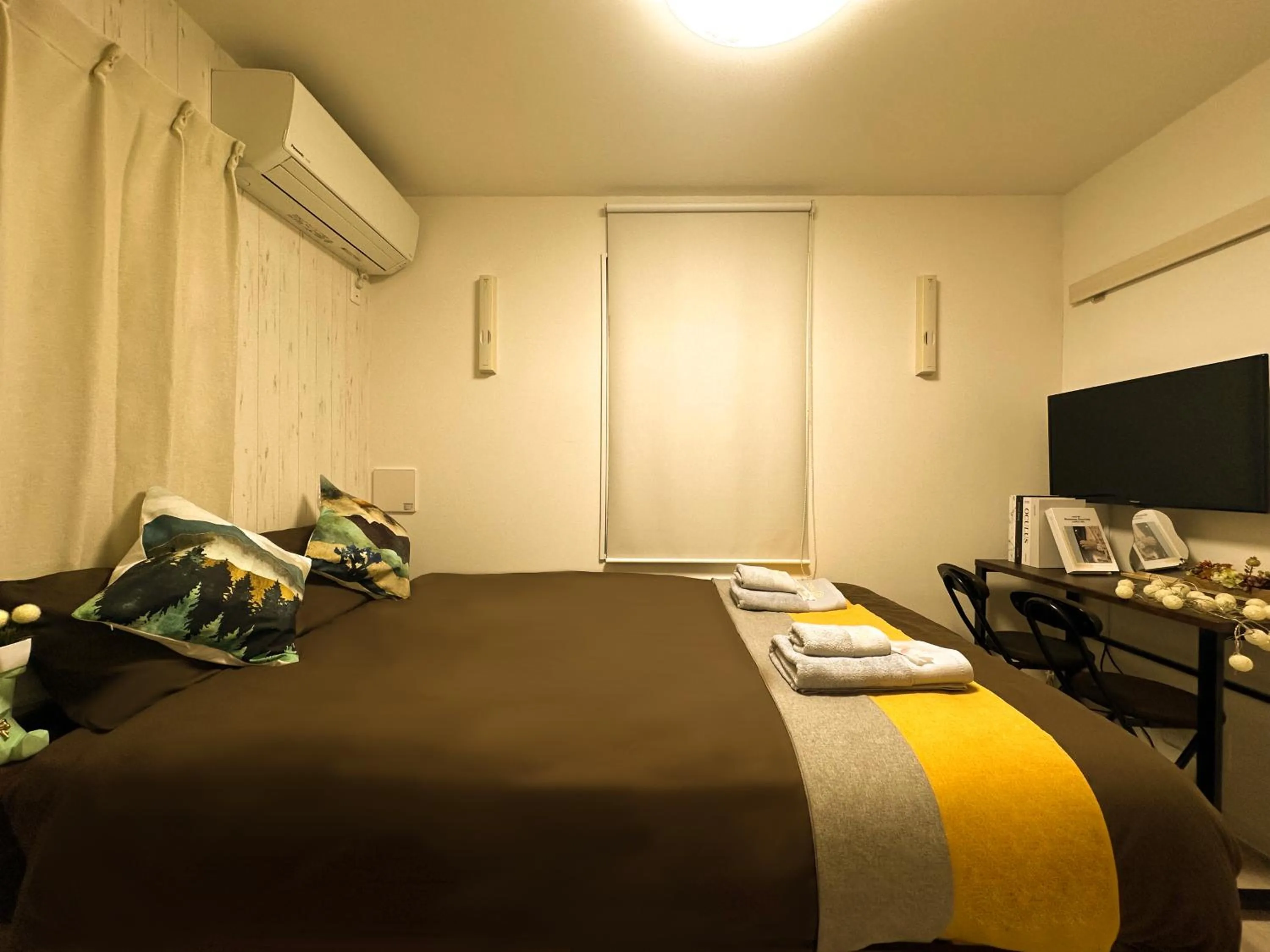 Bed in nestay apartment tokyo waseda