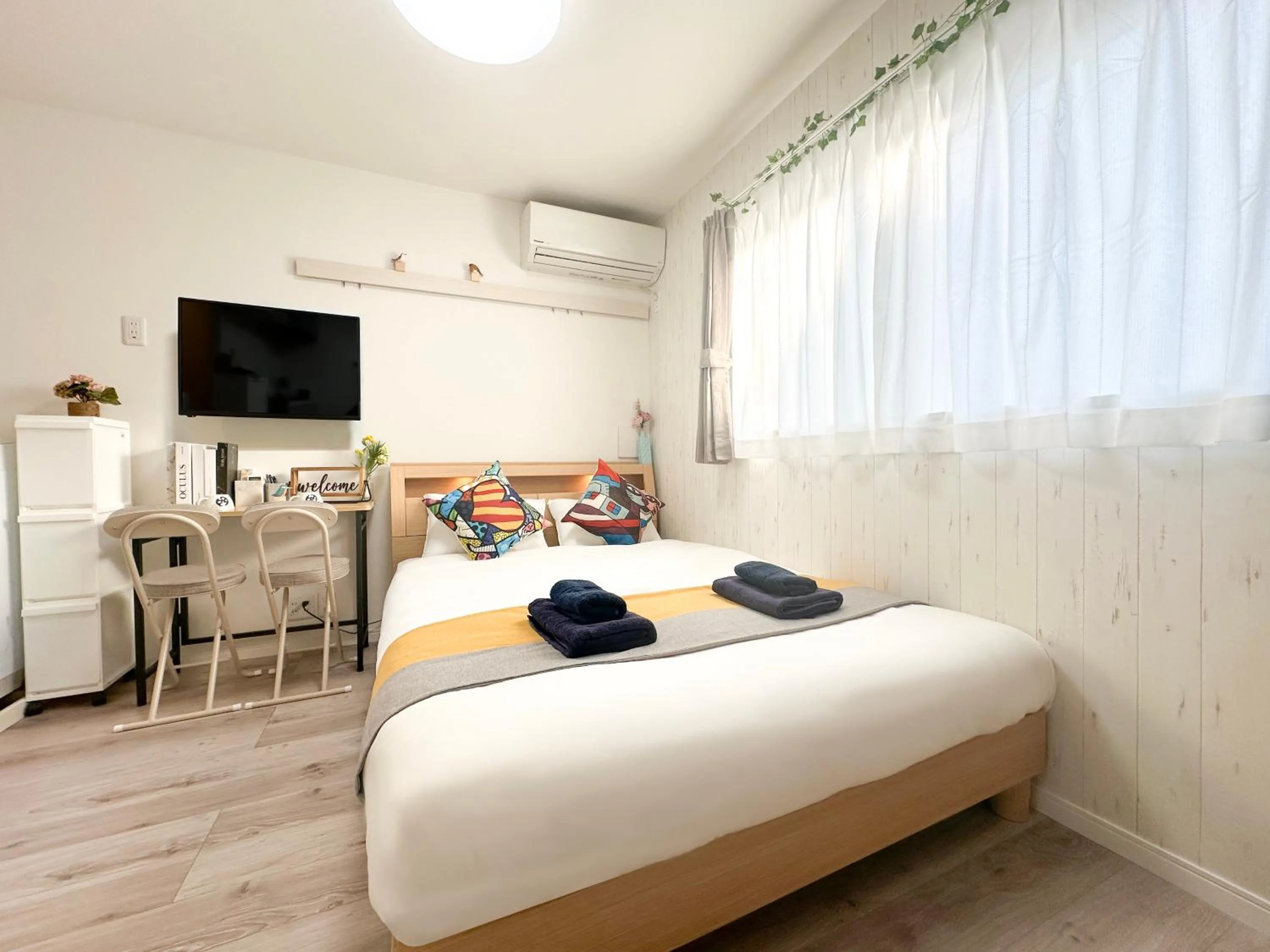 Bed in nestay apartment tokyo waseda