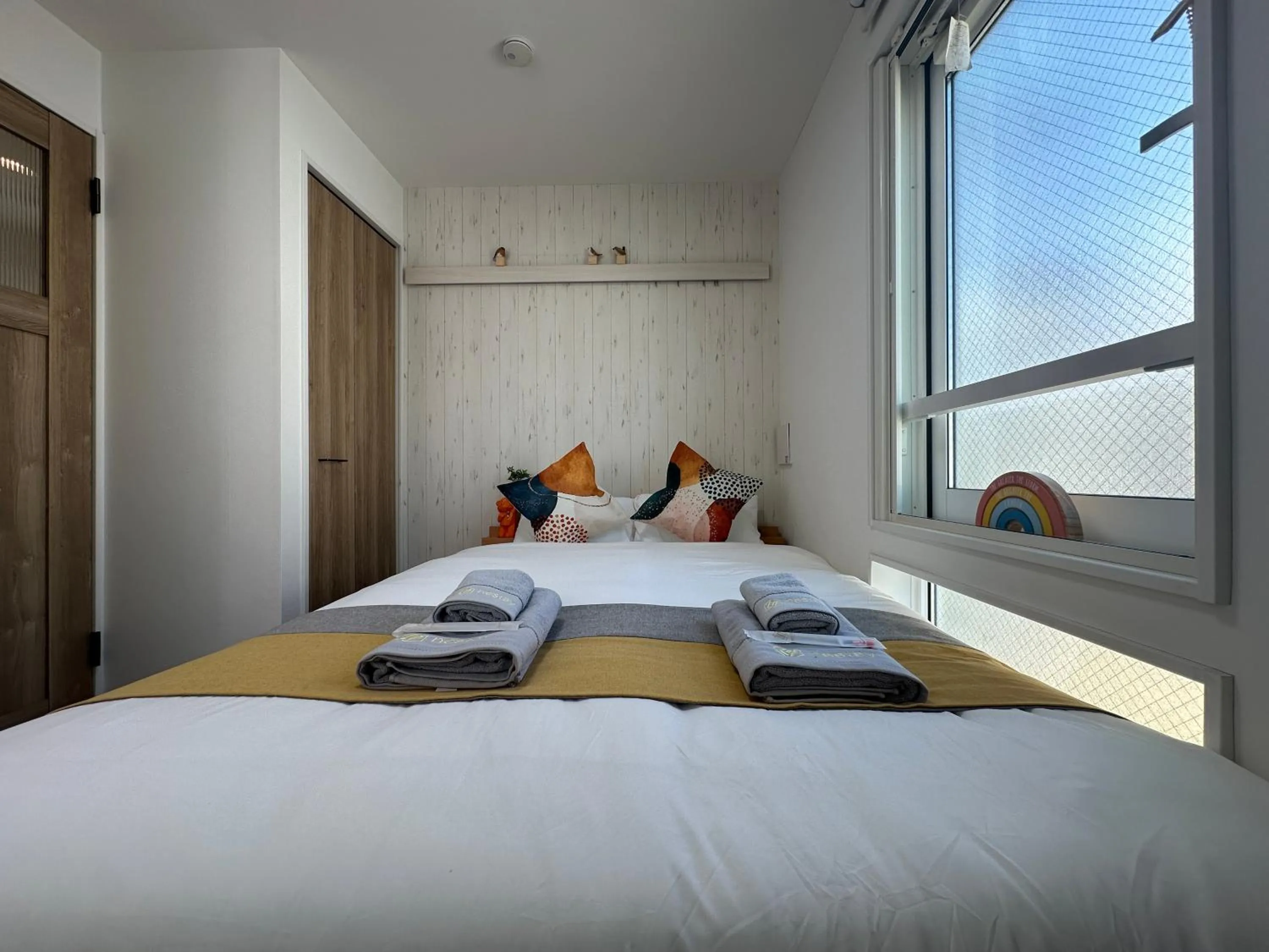 Bed in nestay apartment tokyo waseda