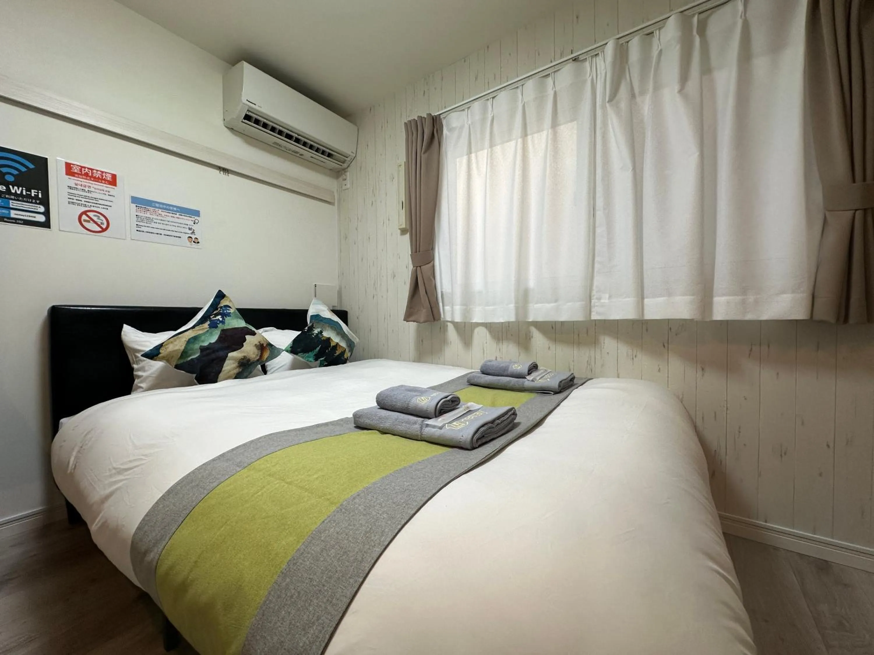 Bed in nestay apartment tokyo waseda