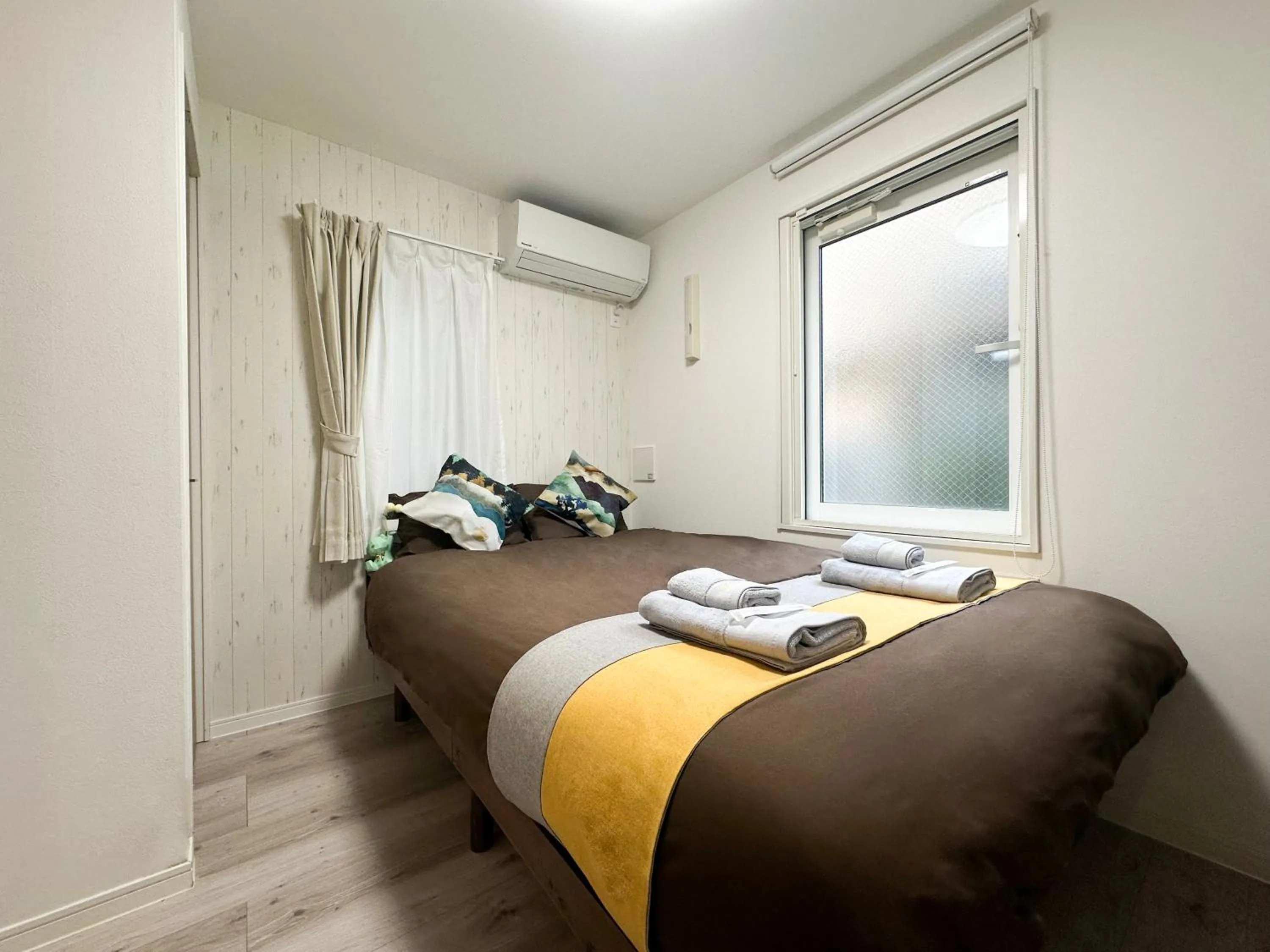 Bed in nestay apartment tokyo waseda