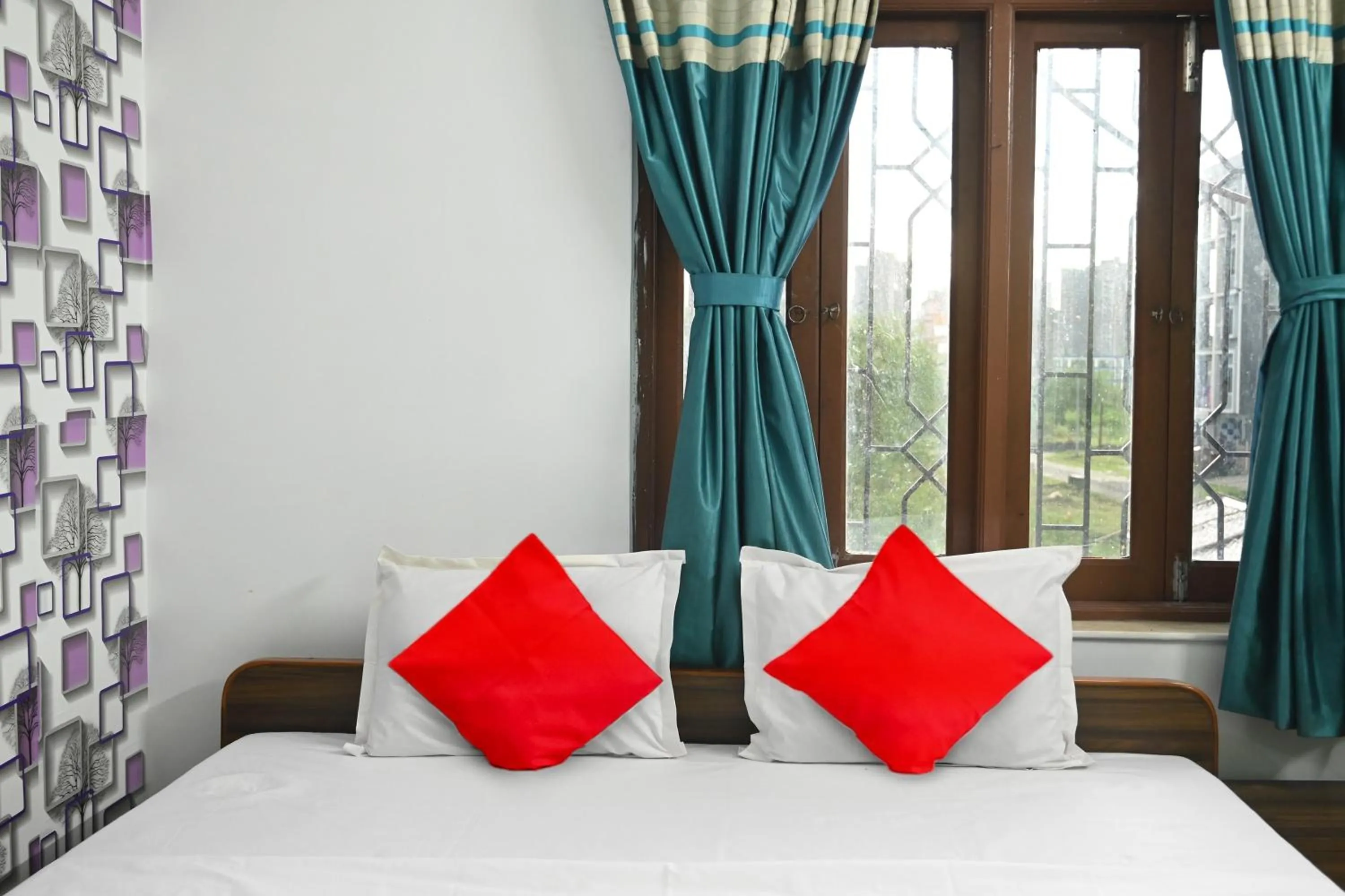 Bedroom, Bed in Hotel O Shraddha Residency 2