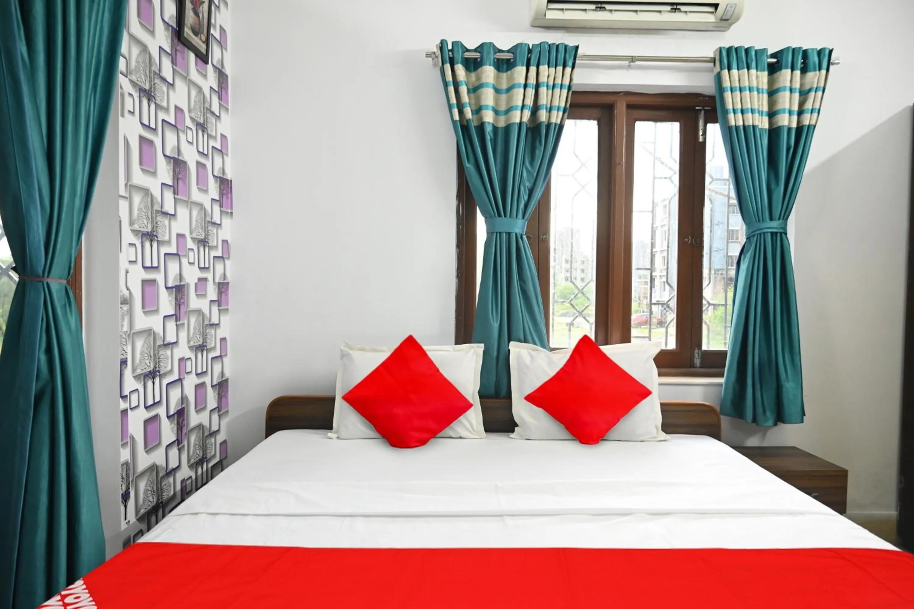 Bedroom, Bed in Hotel O Shraddha Residency 2