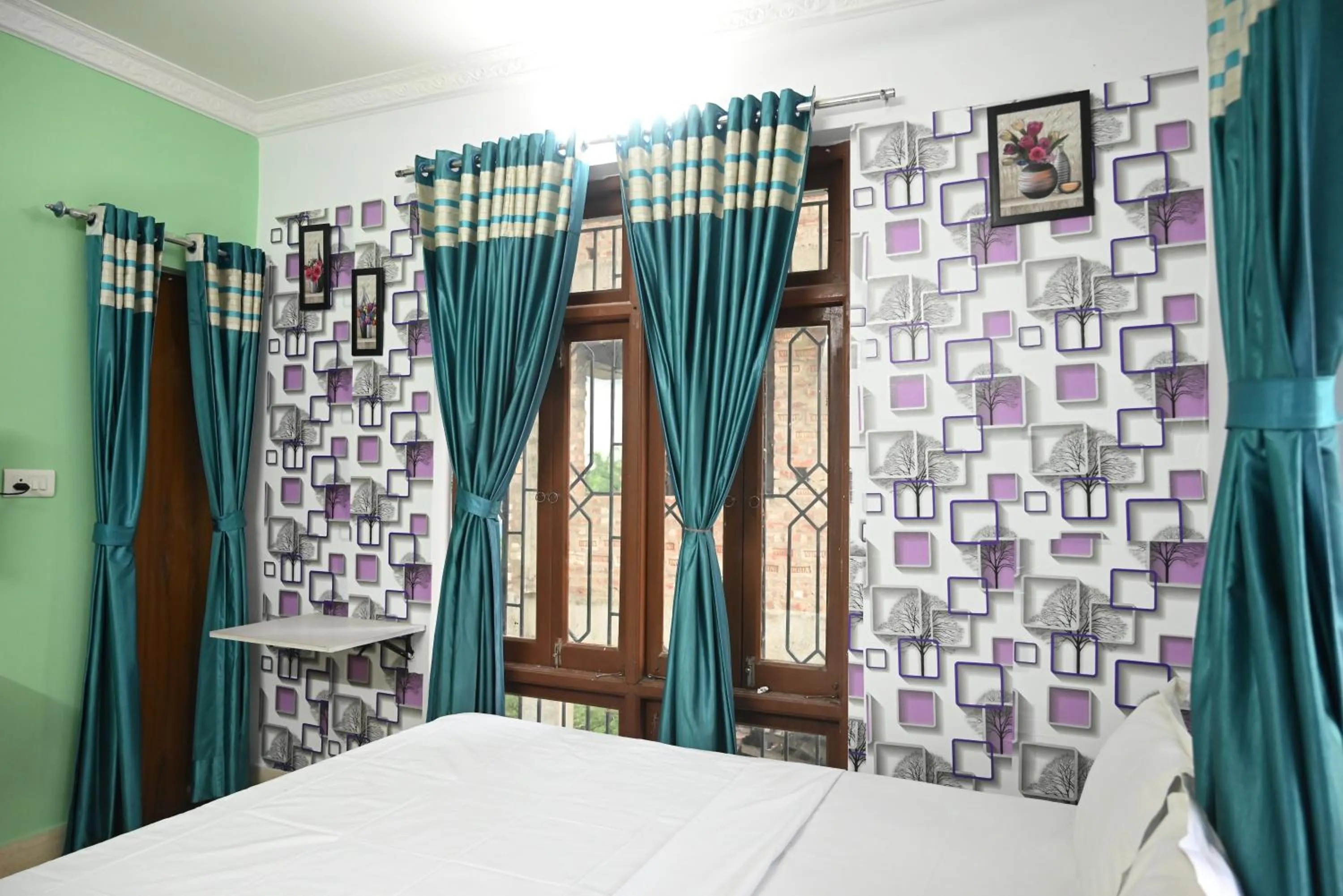 Bedroom, Bed in Hotel O Shraddha Residency 2