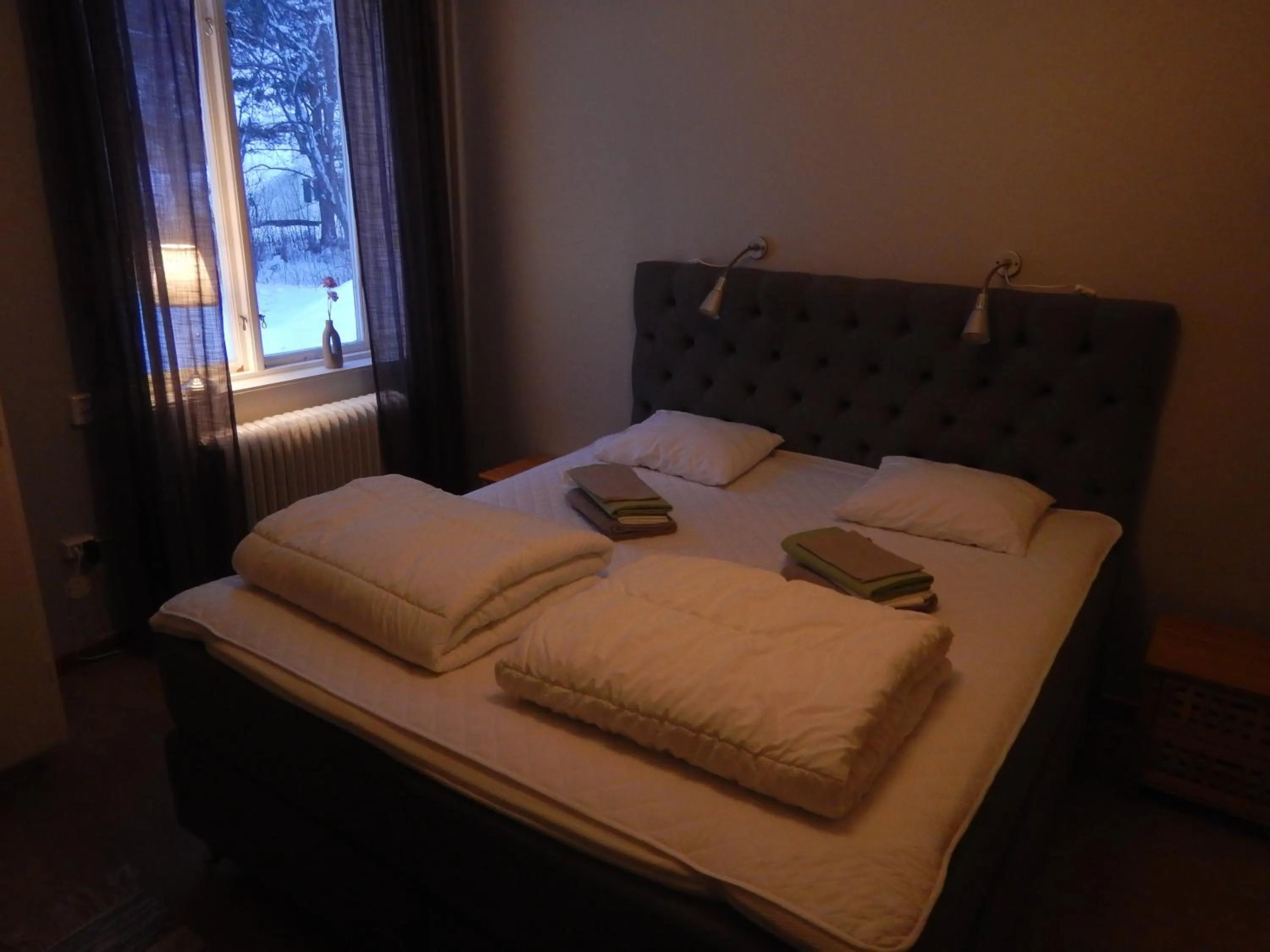 Photo of the whole room, Bed in Jokkmokks Vandrarhem Åsgård