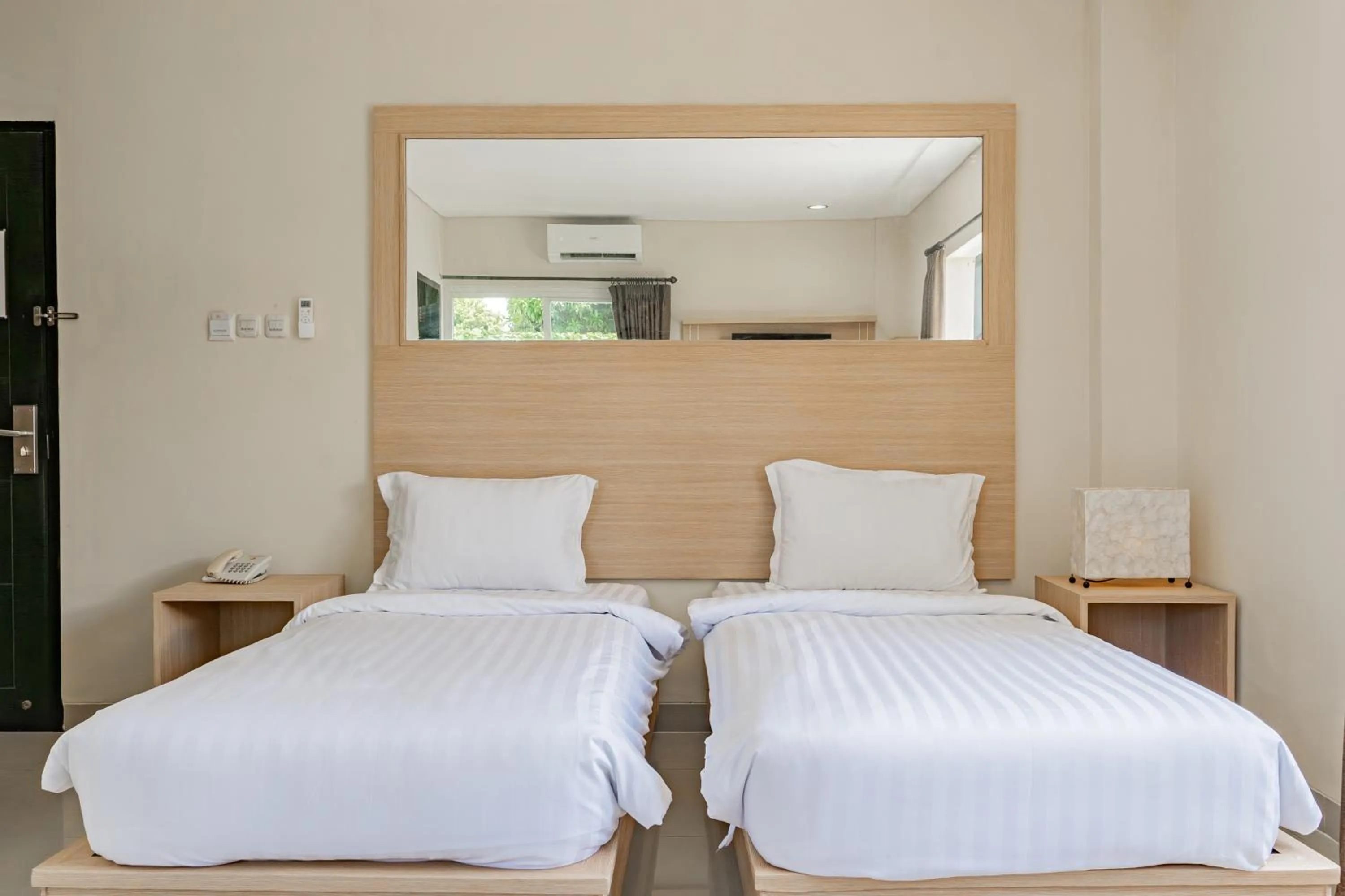 Photo of the whole room, Bed in Collection O Kuta Near Airport Ngurah Rai
