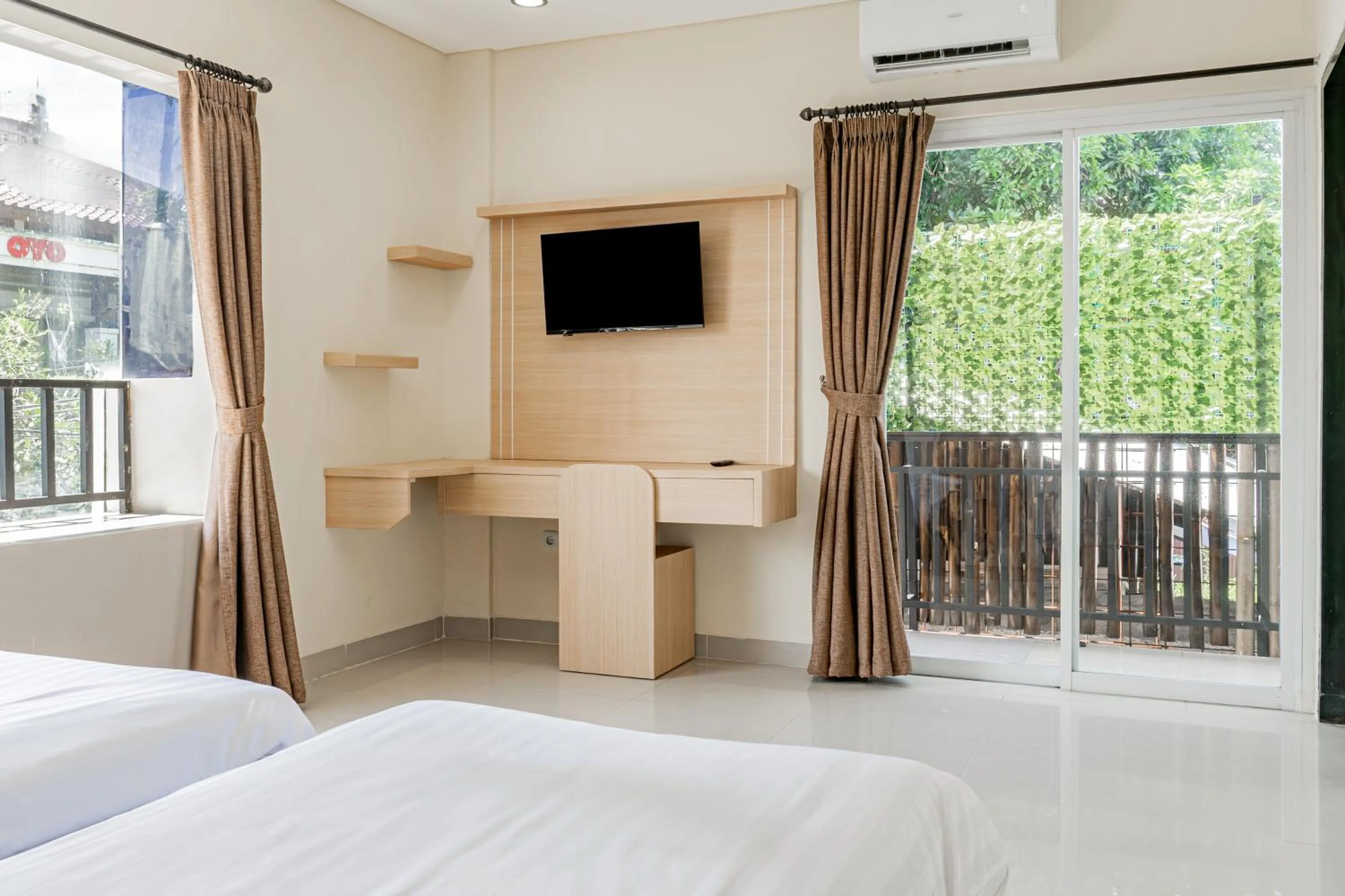 Photo of the whole room, Bed in Collection O Kuta Near Airport Ngurah Rai