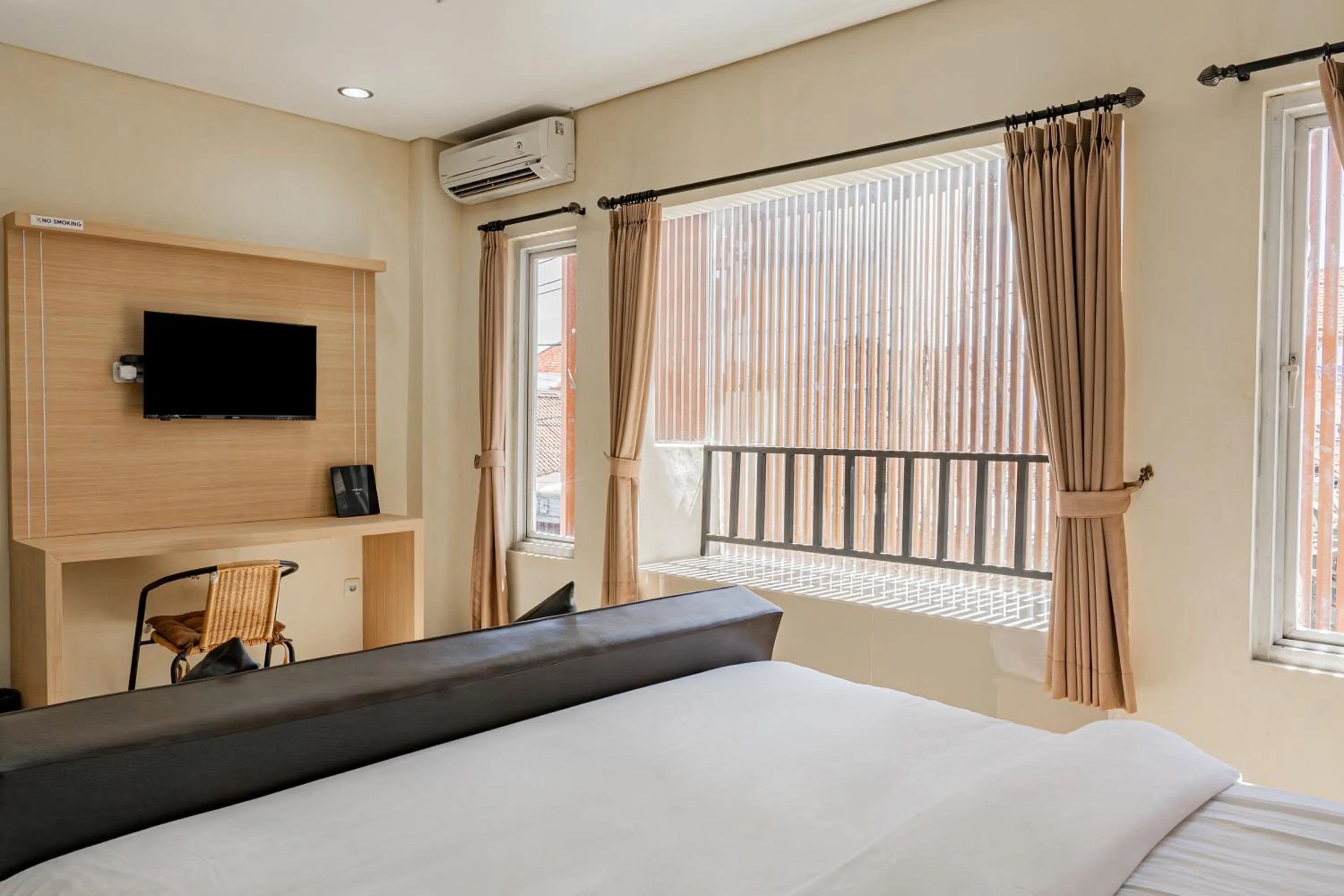 Photo of the whole room, Bed in Collection O Kuta Near Airport Ngurah Rai