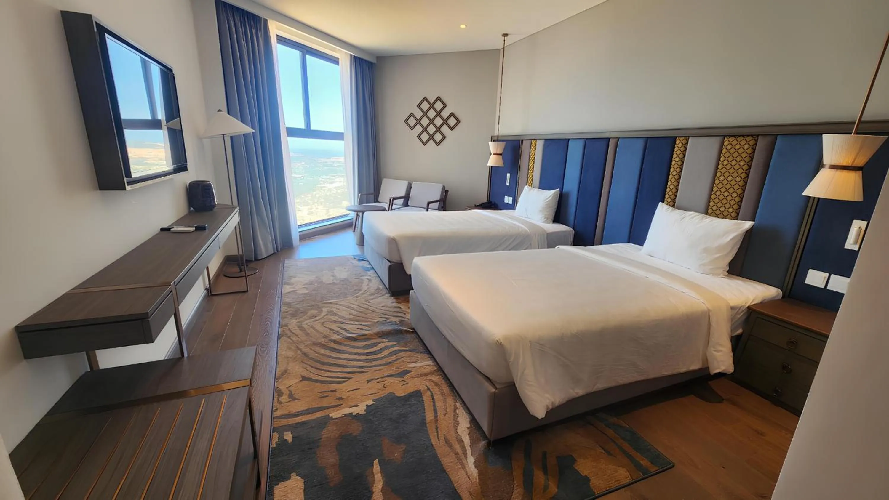 Bed in Apec Luxe Escape Sunset Resort