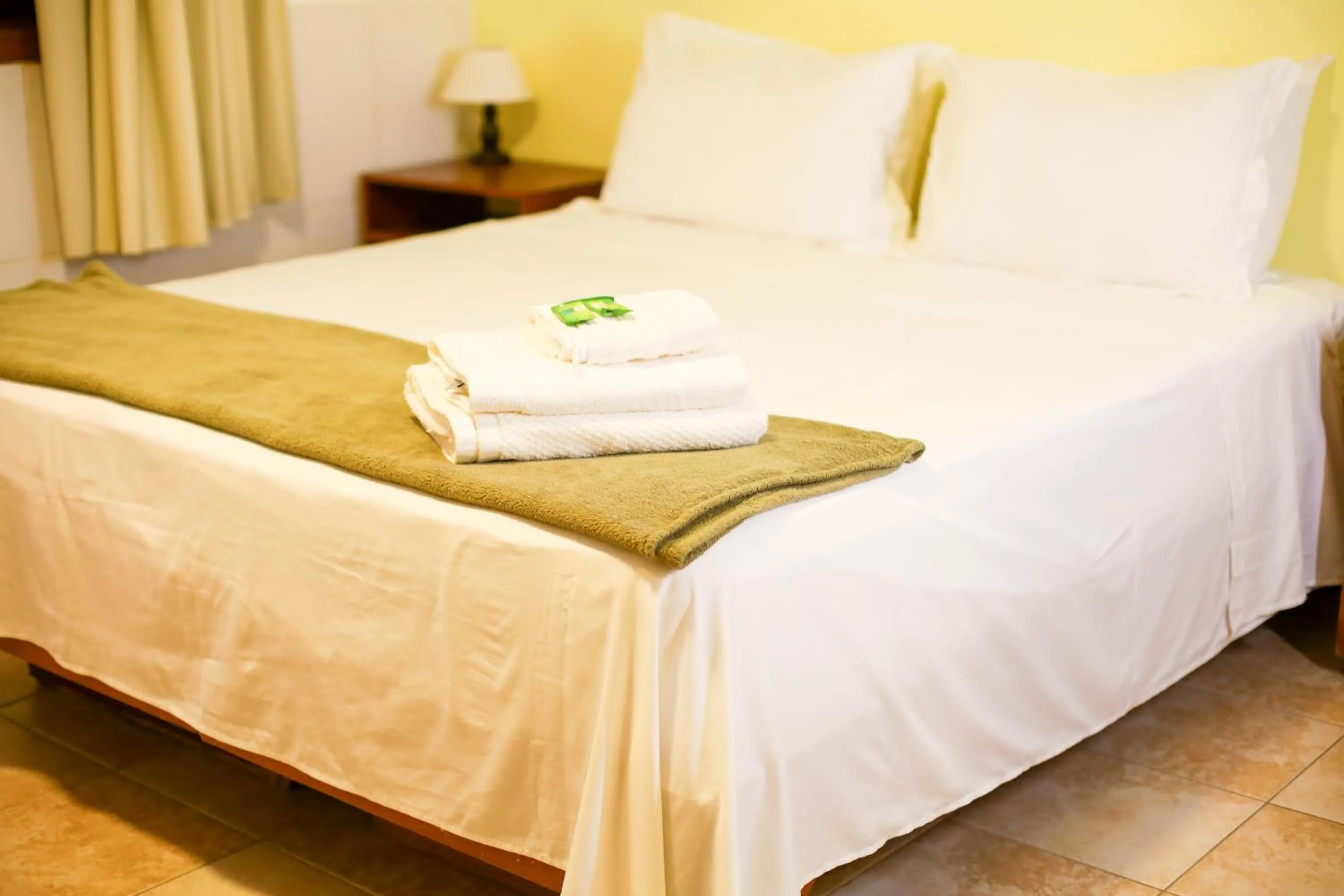 Bed in Pousada Maristella