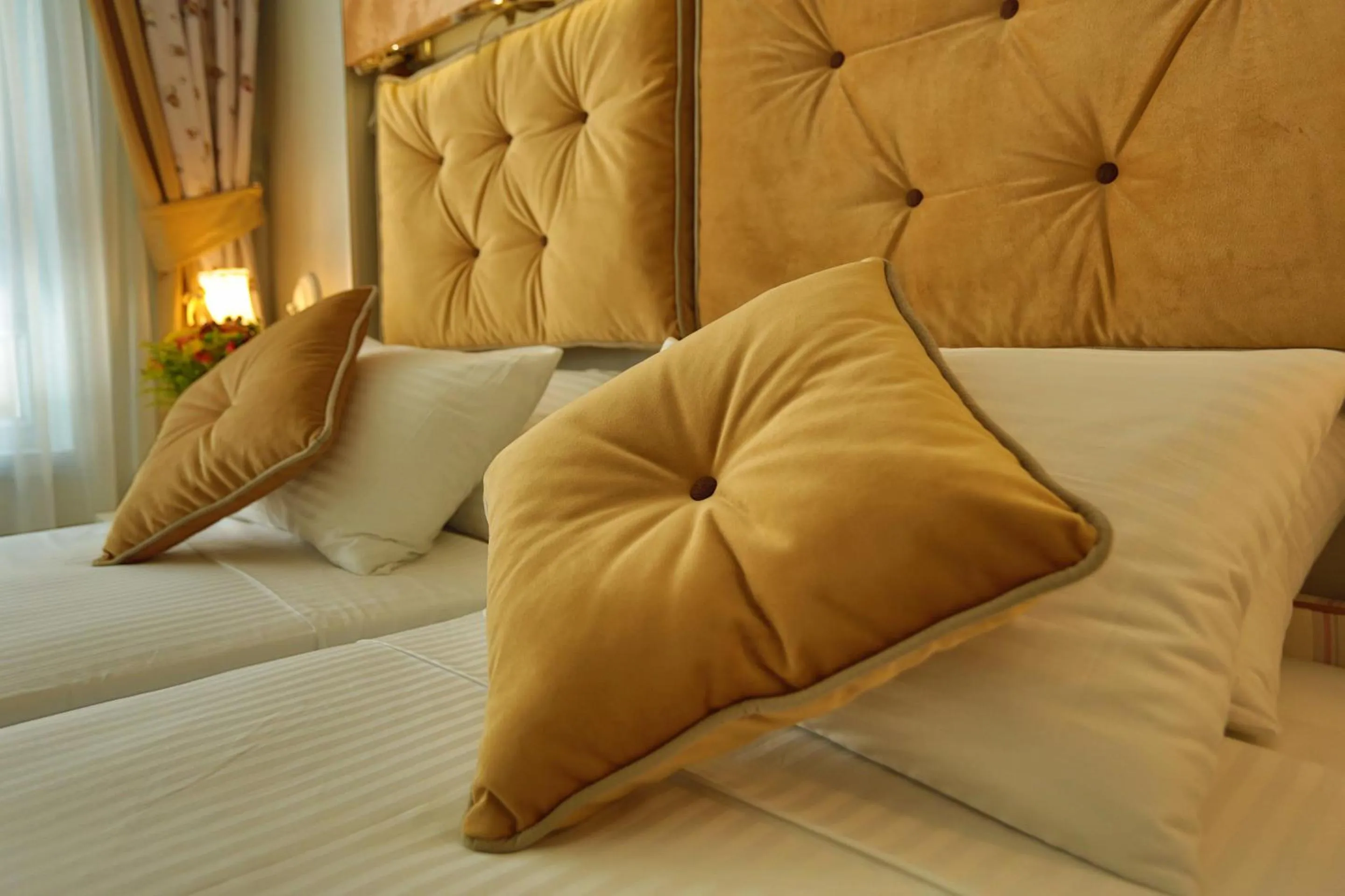 Decorative detail, Bed in Just Inn Hotel