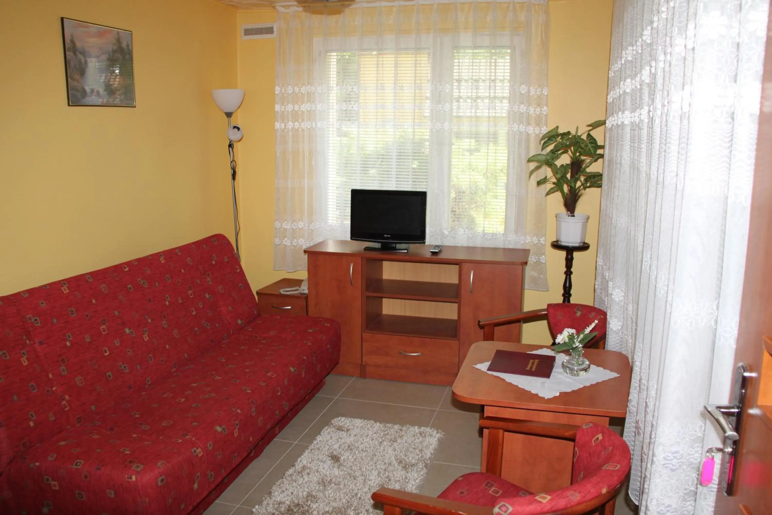 Living room in Hotel Zielony & OW Borowik & Pensjonat Manhattan - Centrum Rekreacji i Wypoczynku GASTROTUR