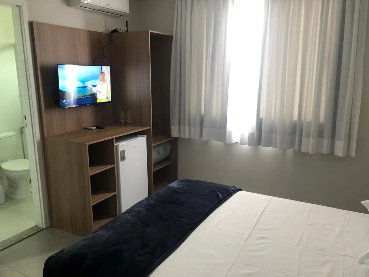 Bathroom, Bed in Hotel Penedo Inn