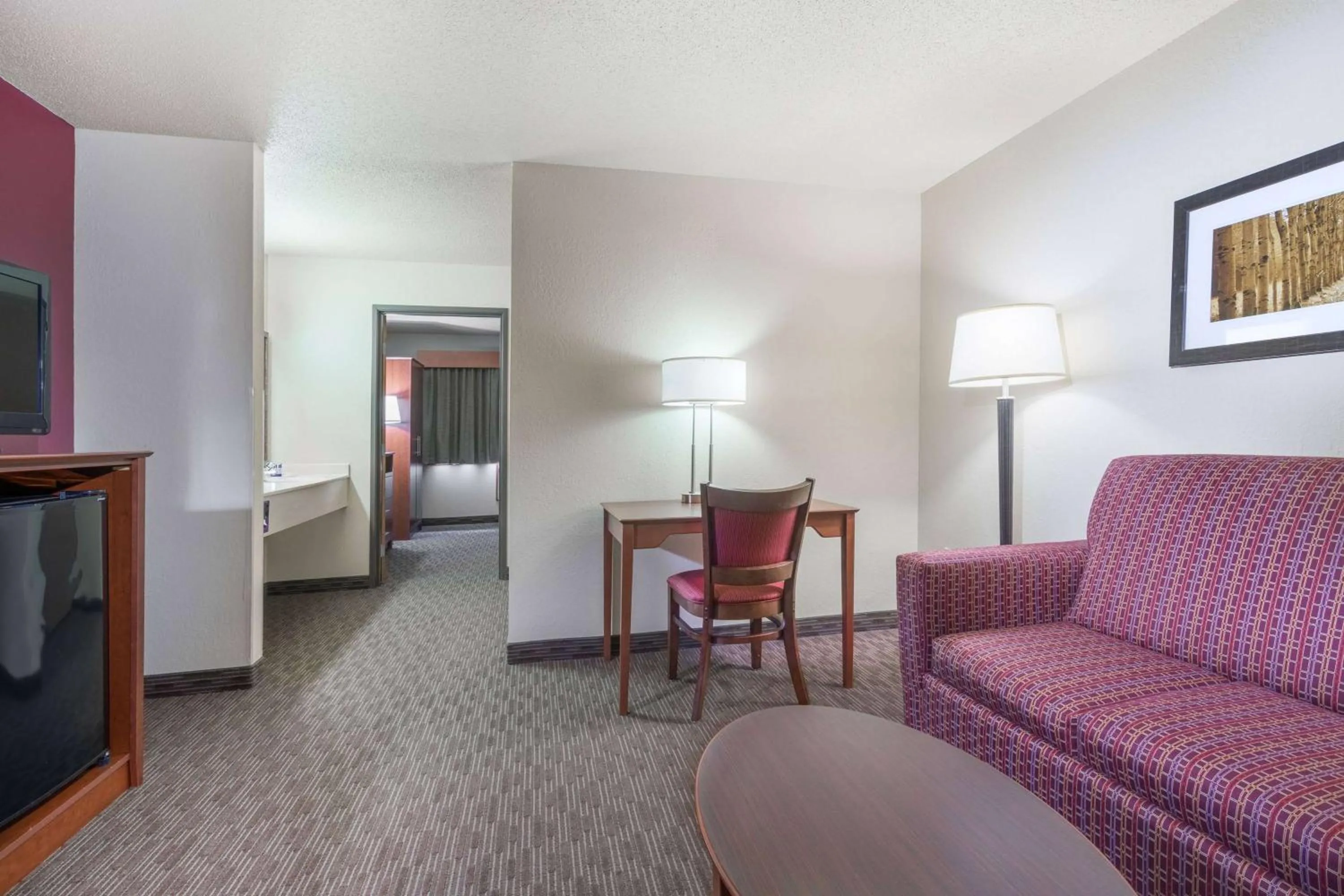 Bedroom in AmericInn by Wyndham Baldwin