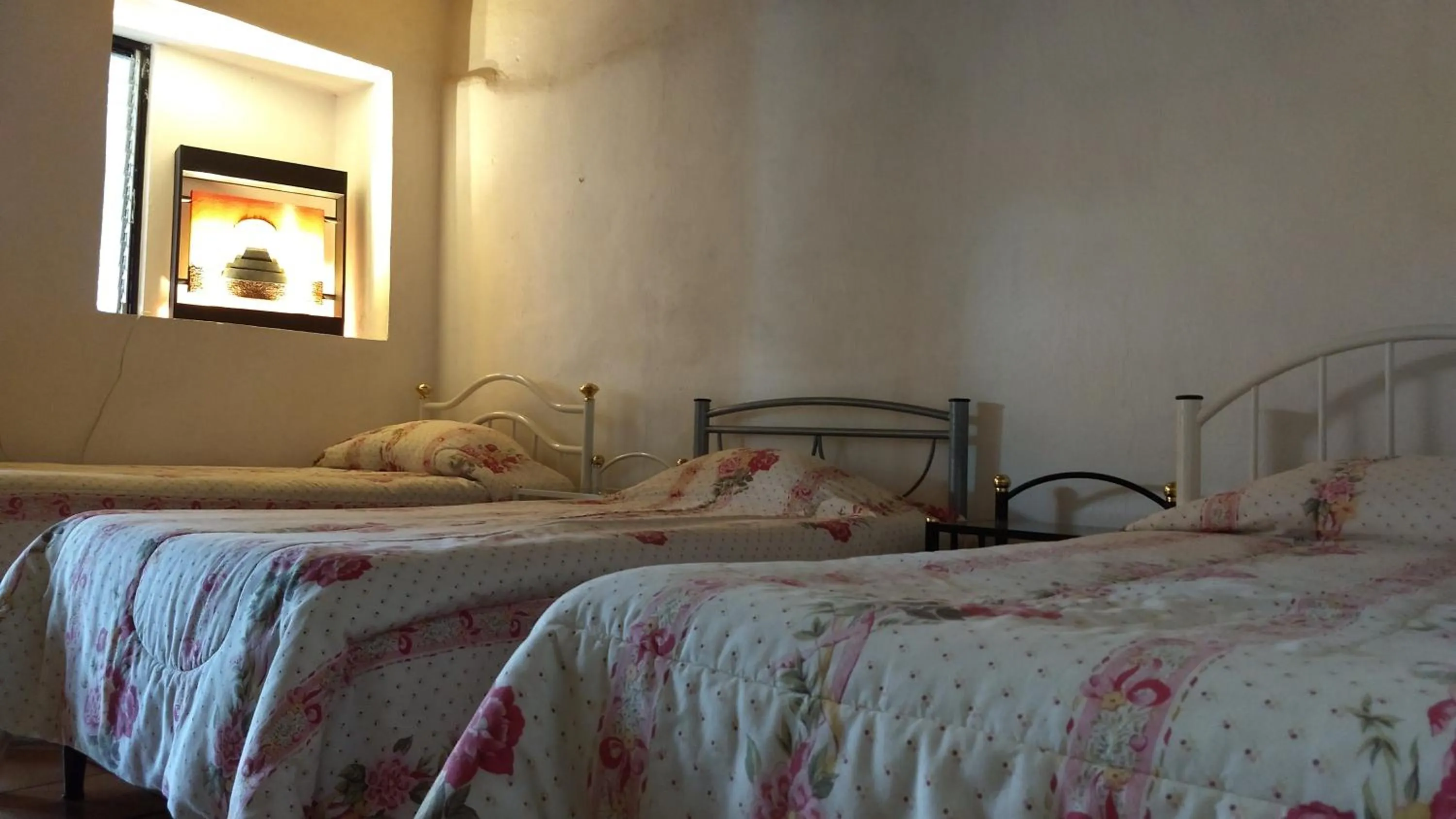 Bed in Posada Cuallicochi