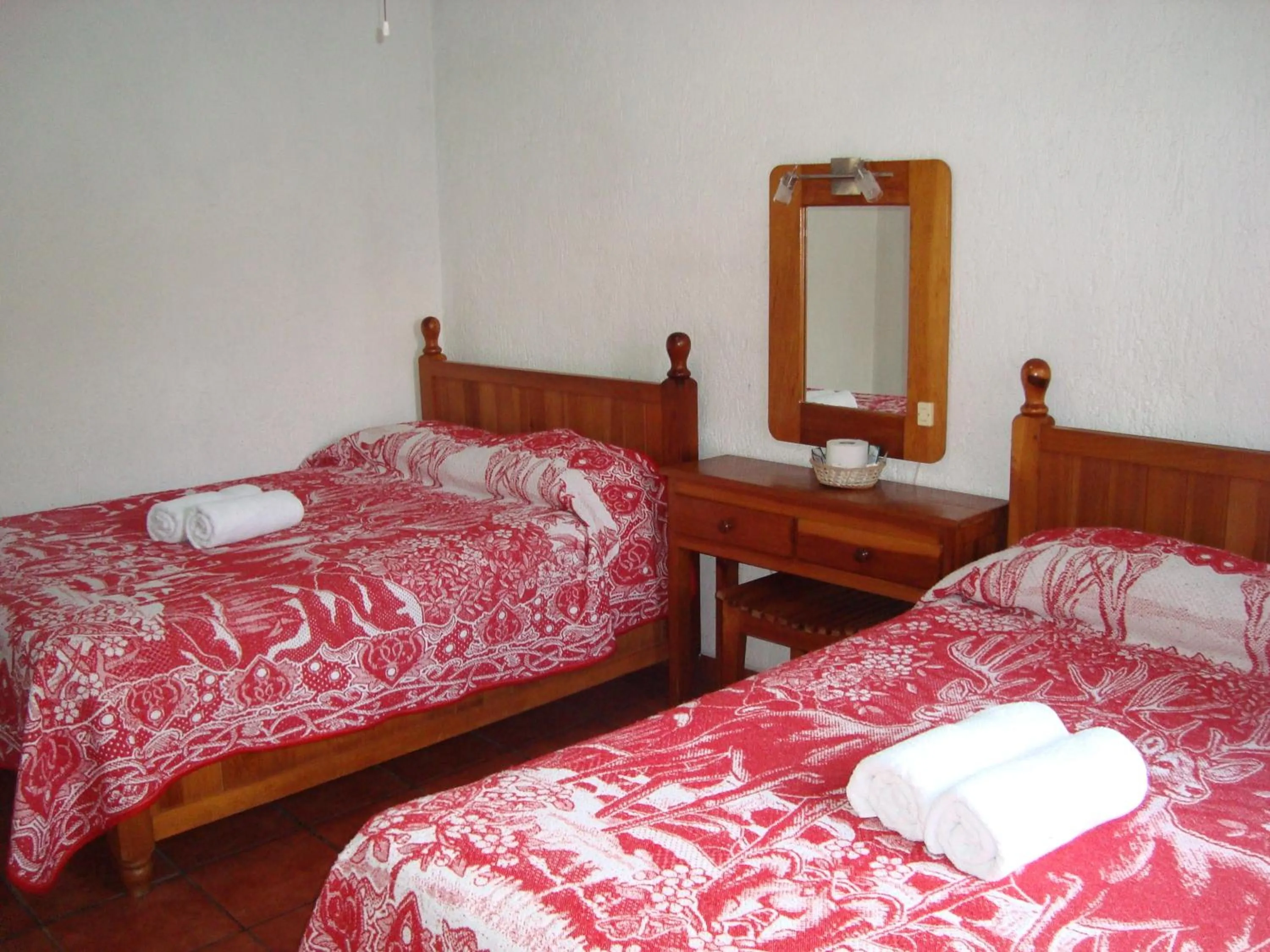 Bed in Posada Cuallicochi