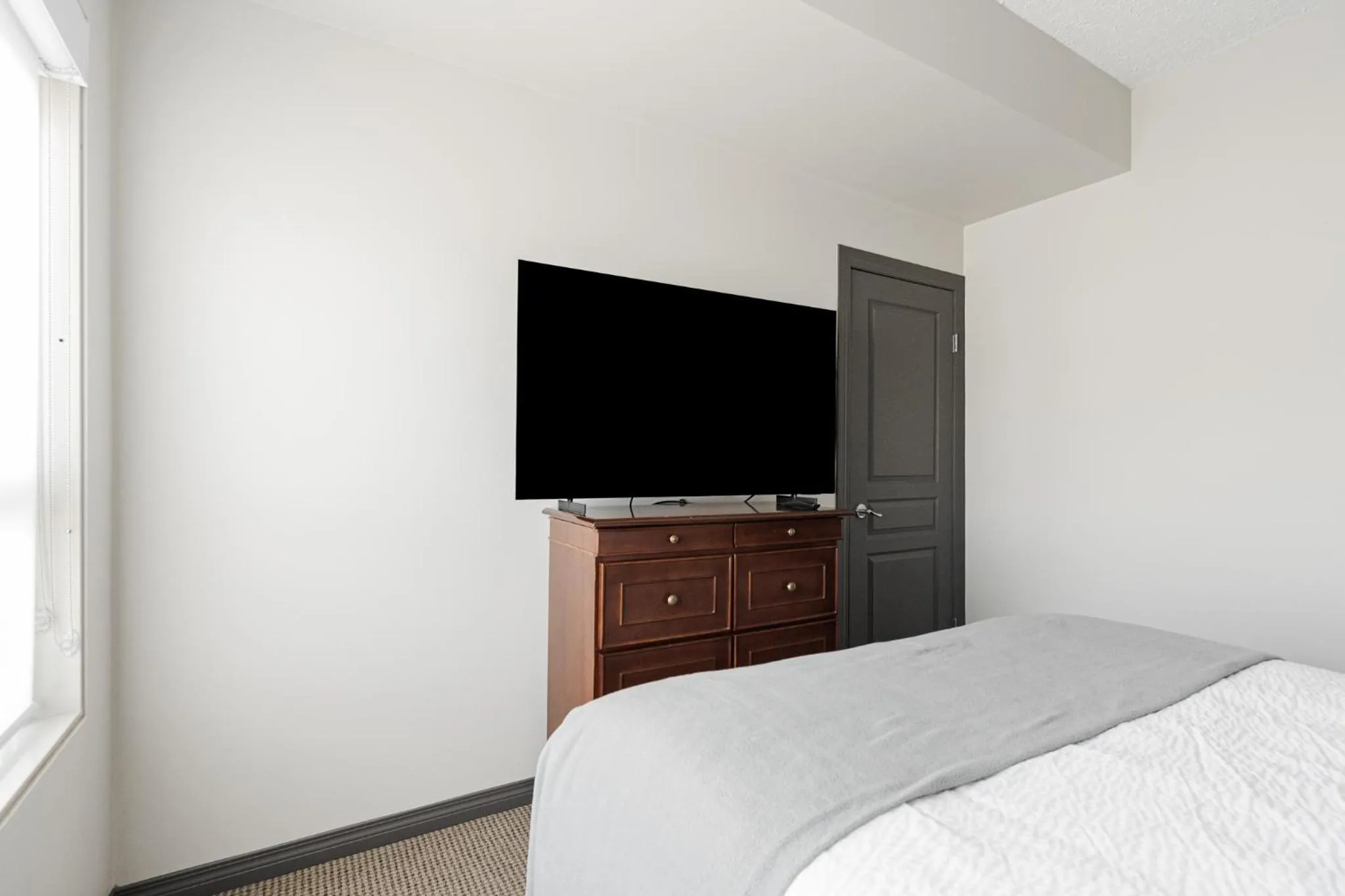 Bedroom, Bed in Premier Residence - Fort McMurray