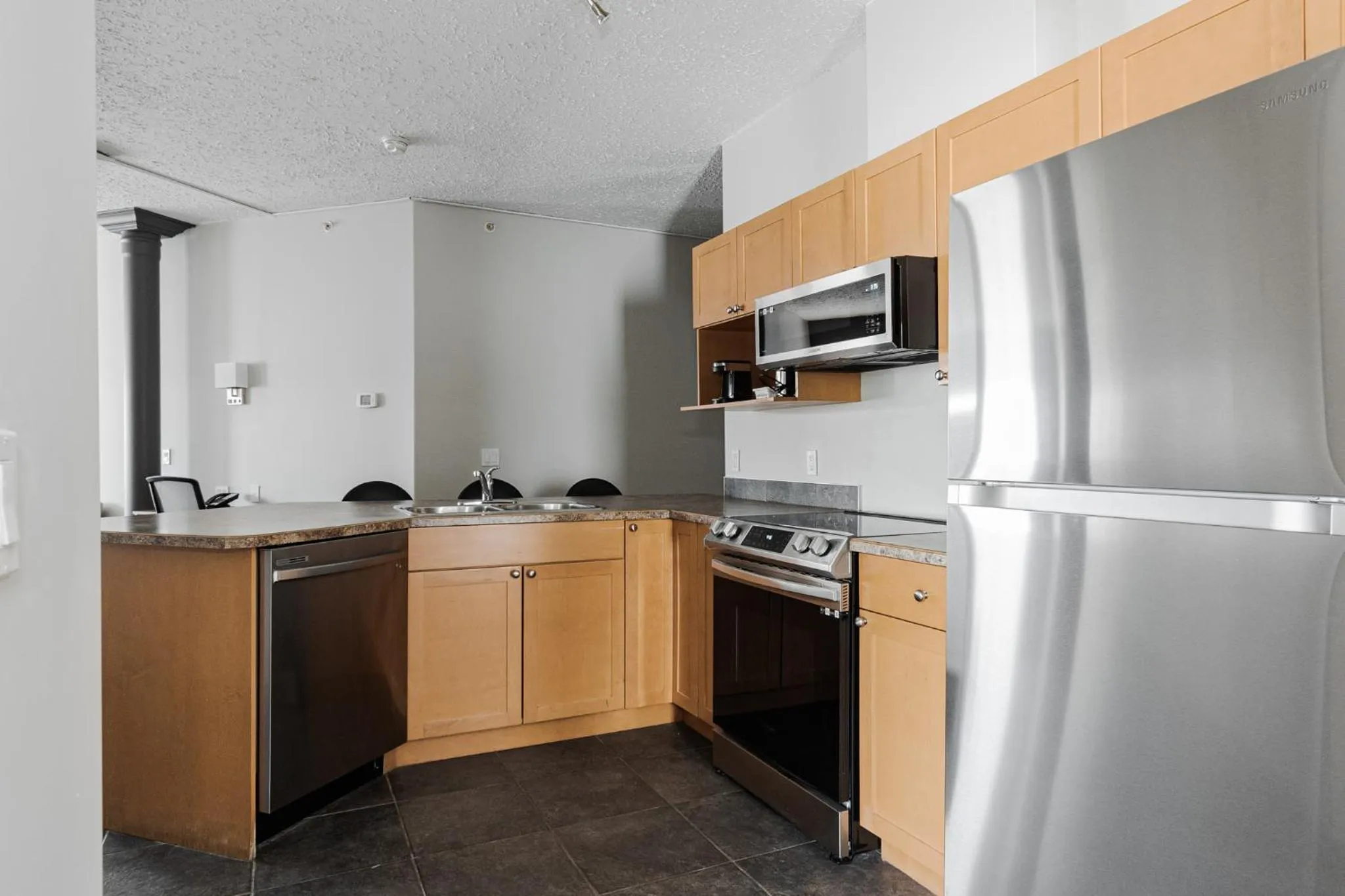 Kitchen or kitchenette in Premier Residence - Fort McMurray