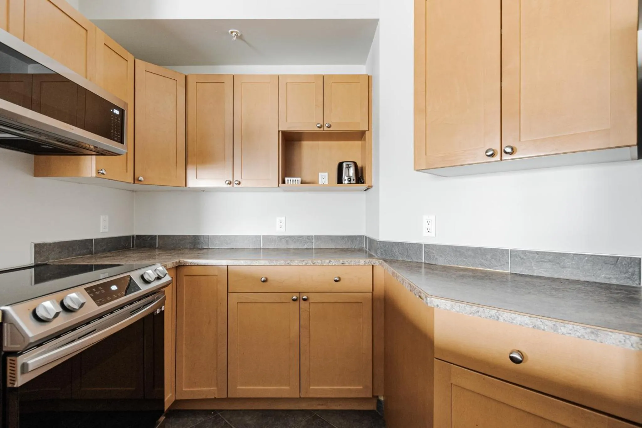 Kitchen or kitchenette in Premier Residence - Fort McMurray