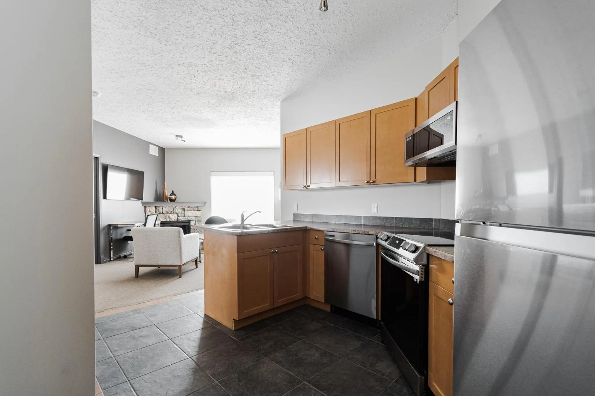 Kitchen or kitchenette in Premier Residence - Fort McMurray