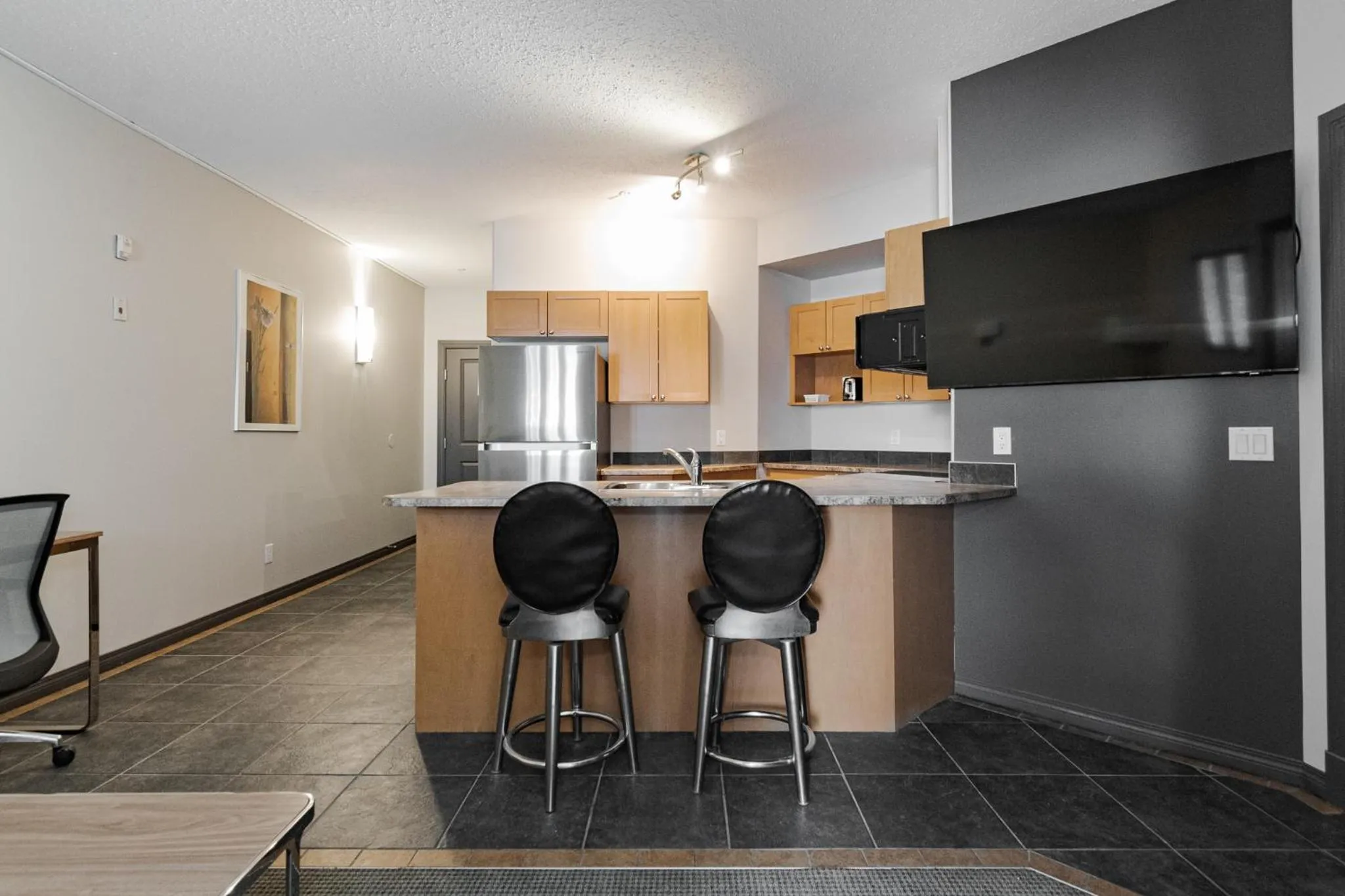 Kitchen or kitchenette in Premier Residence - Fort McMurray