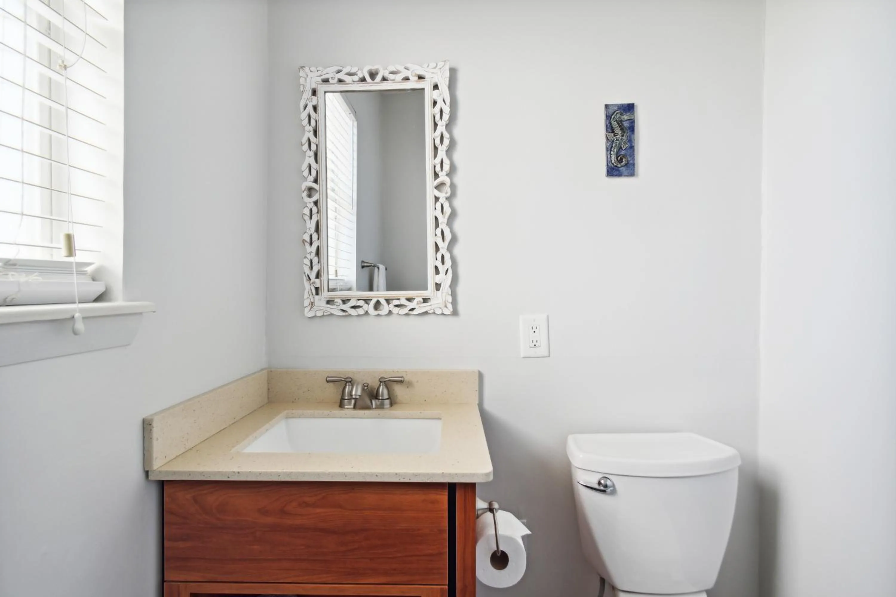 Toilet in Seahorse Oceanfront Inn