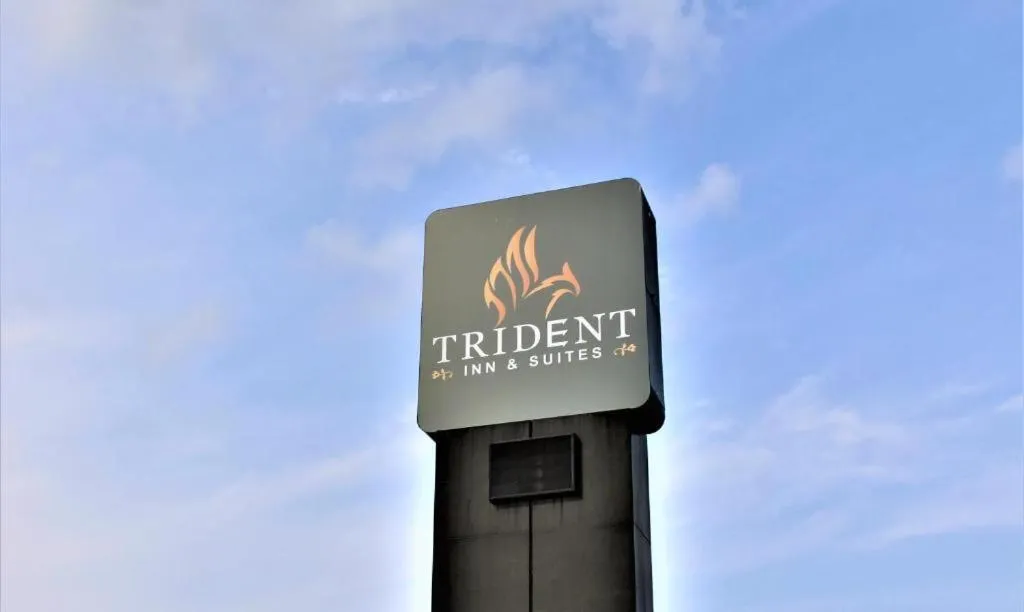 Property logo or sign in Trident Inn & Suites New Orleans