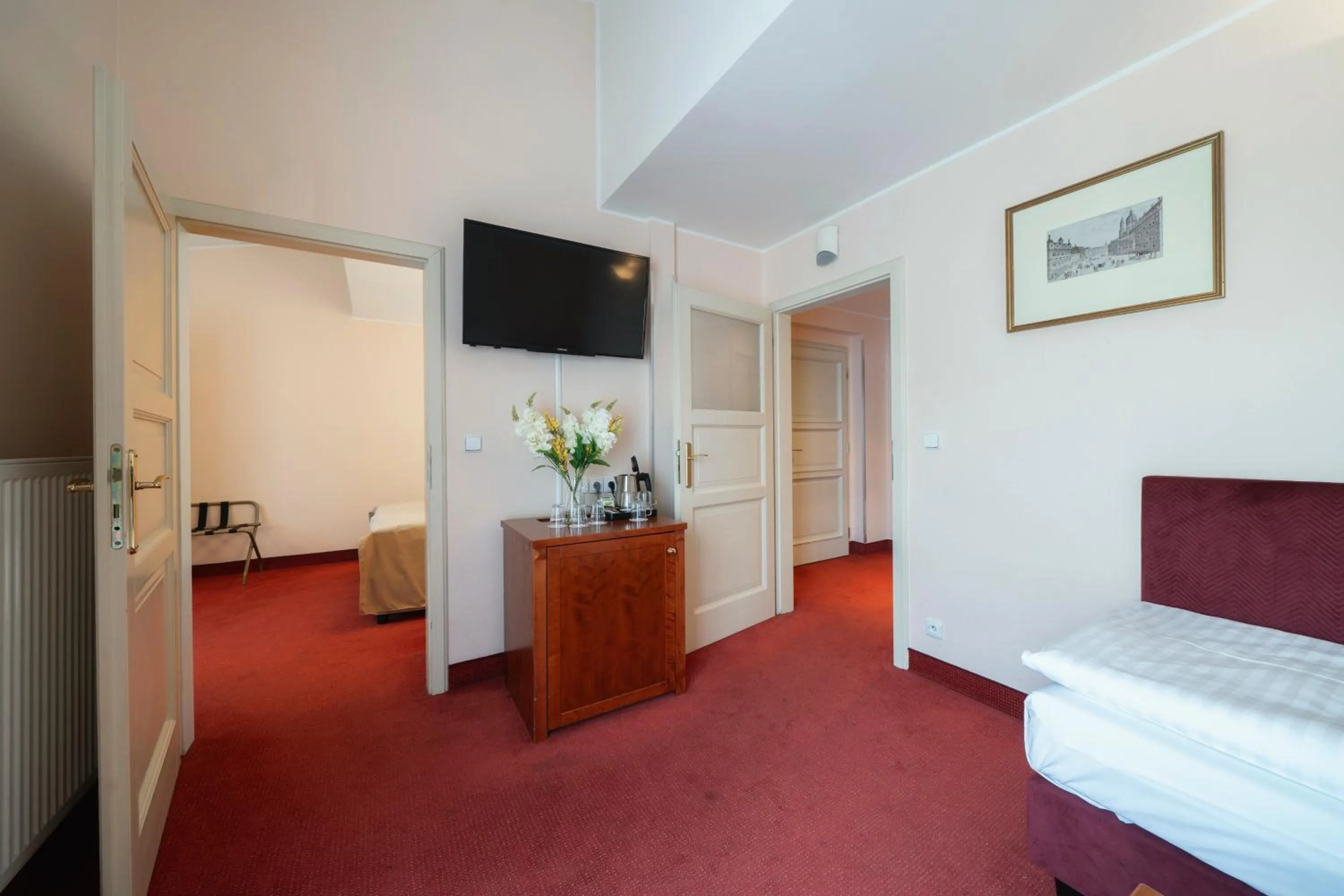 Living room, Bed in Hotel Raffaello Prague