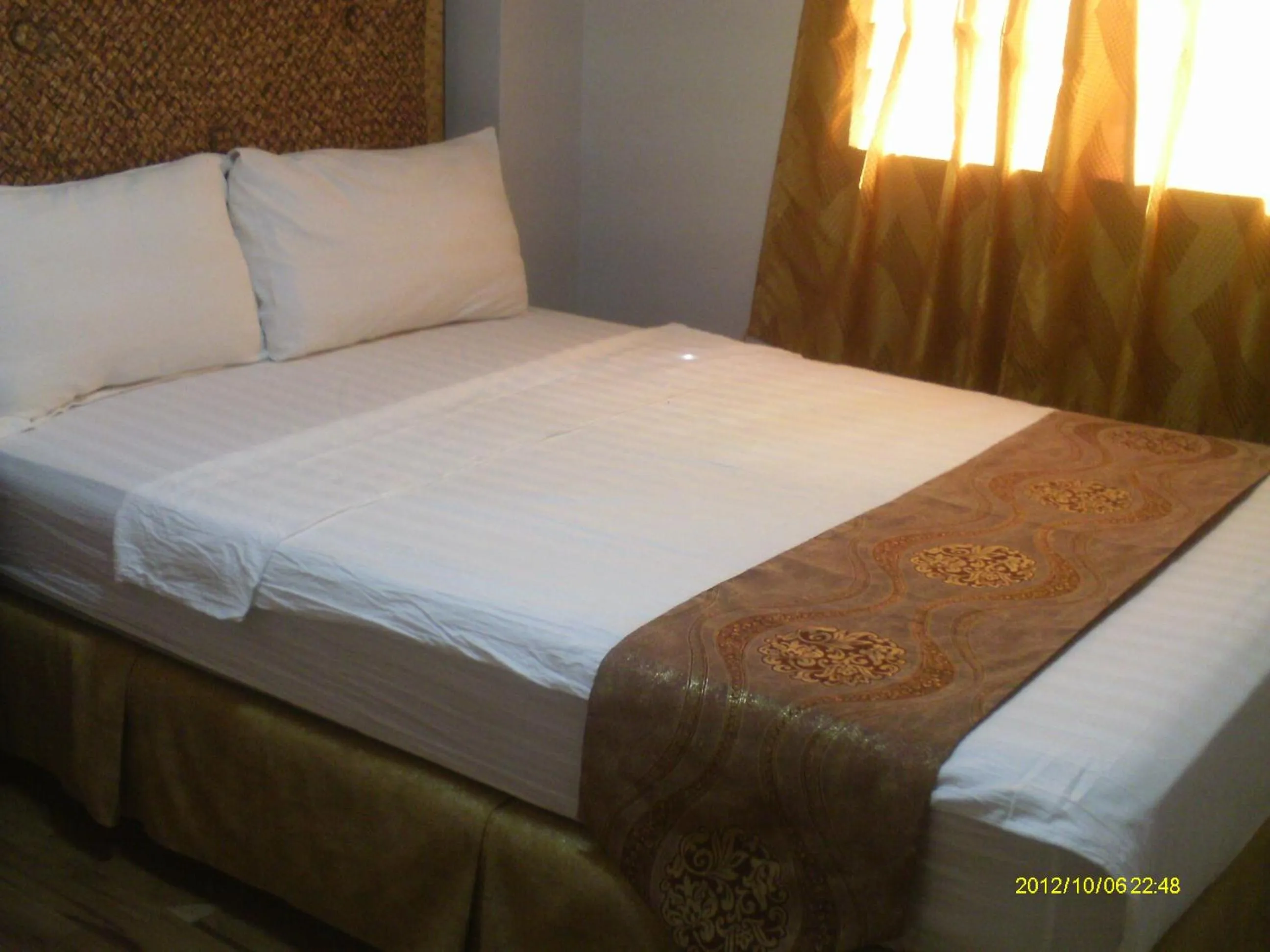 Bed in Malapascua Legend Water Sports and Resort