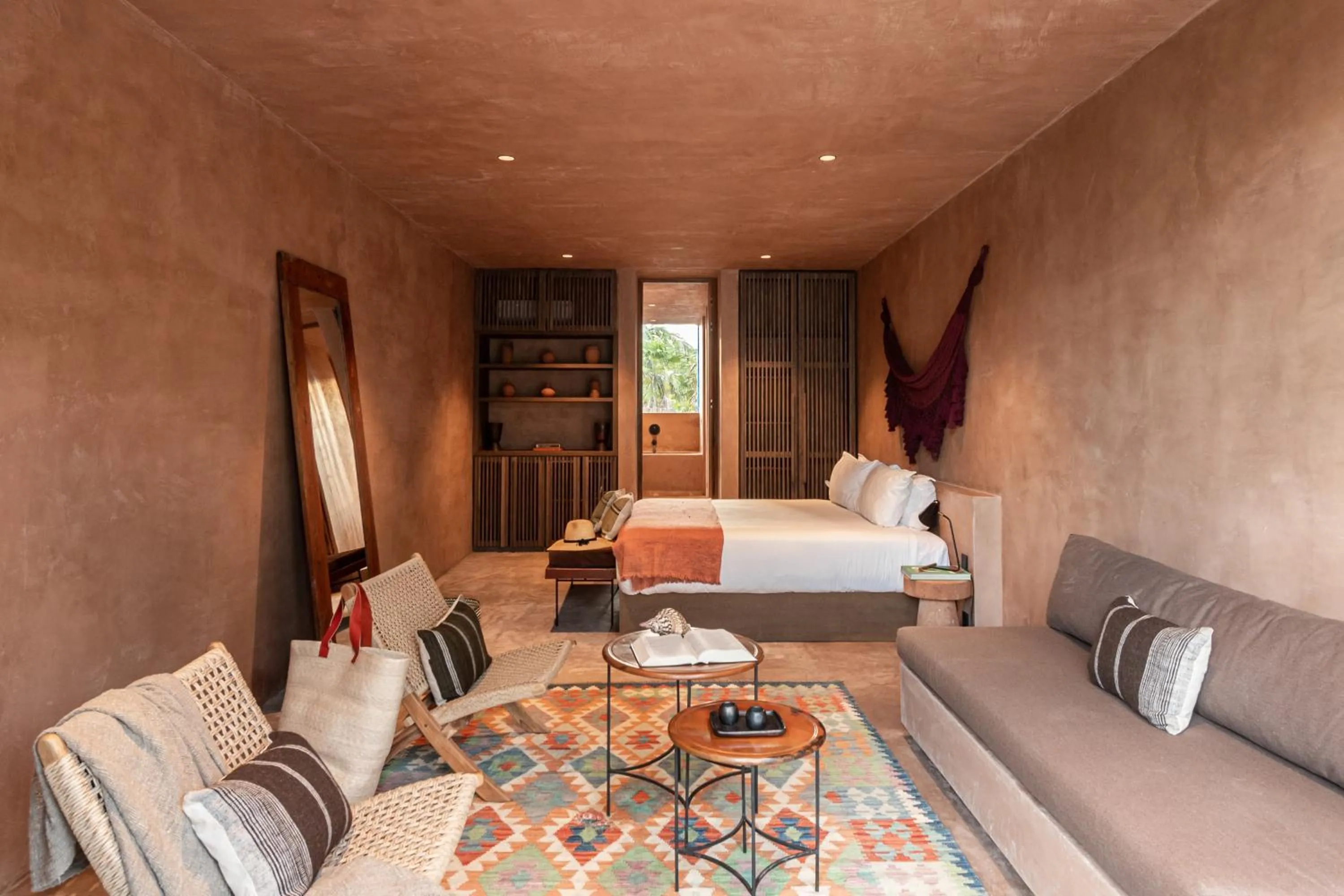 Living room, Bed in Xela Tulum, a Member of Design Hotels