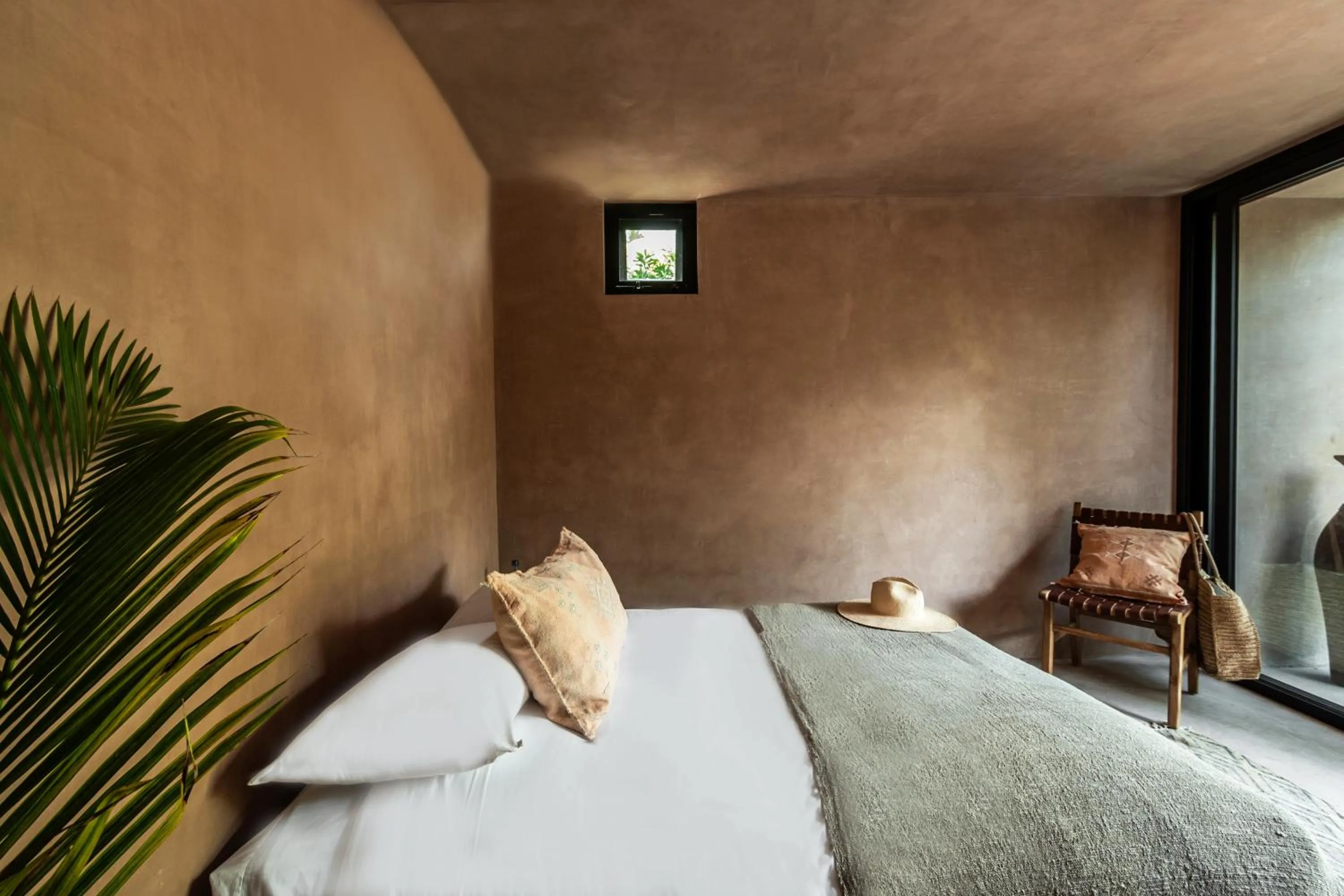 Bed in Xela Tulum, a Member of Design Hotels