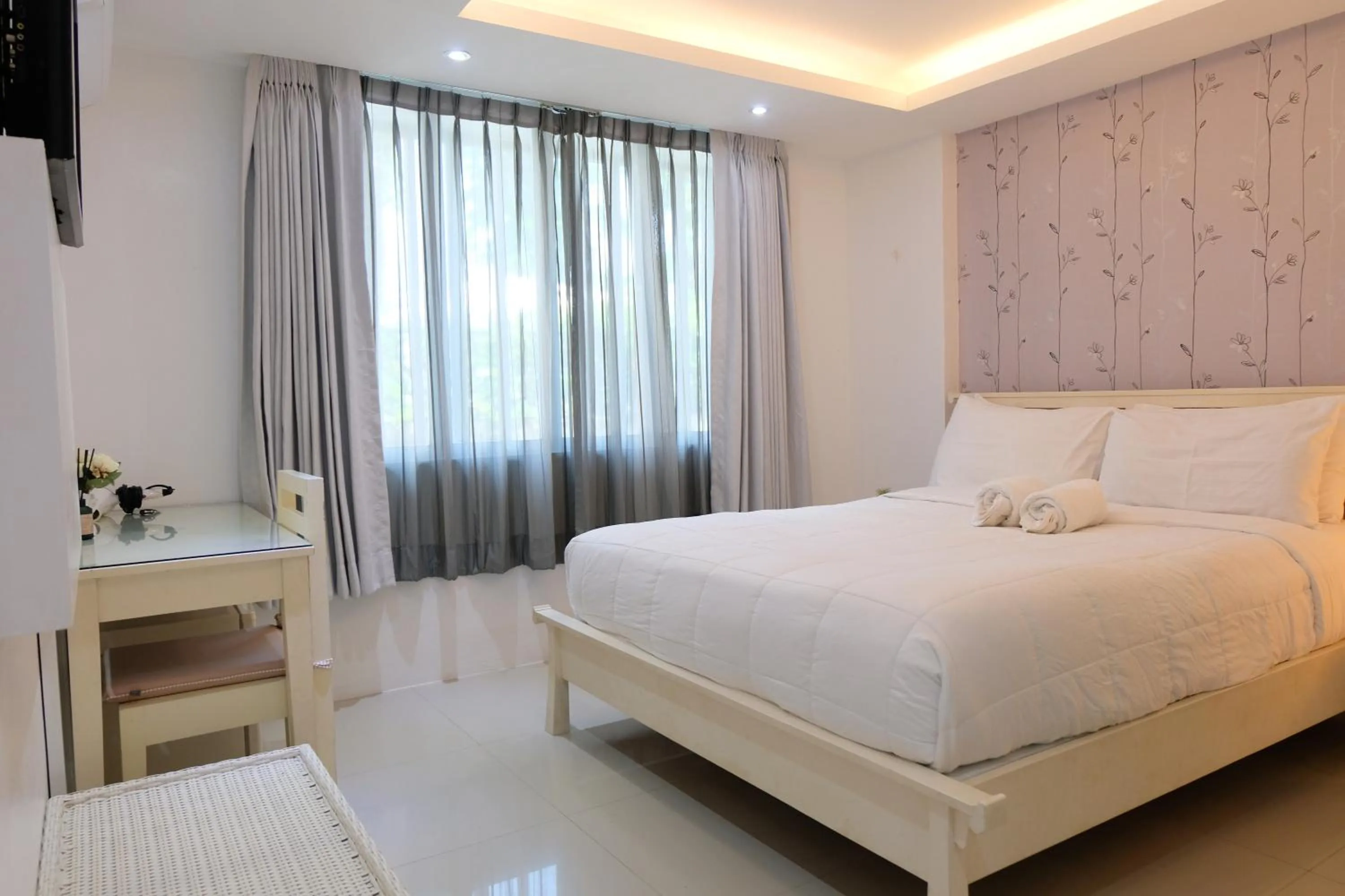 Bed in Baanpoon Apartment