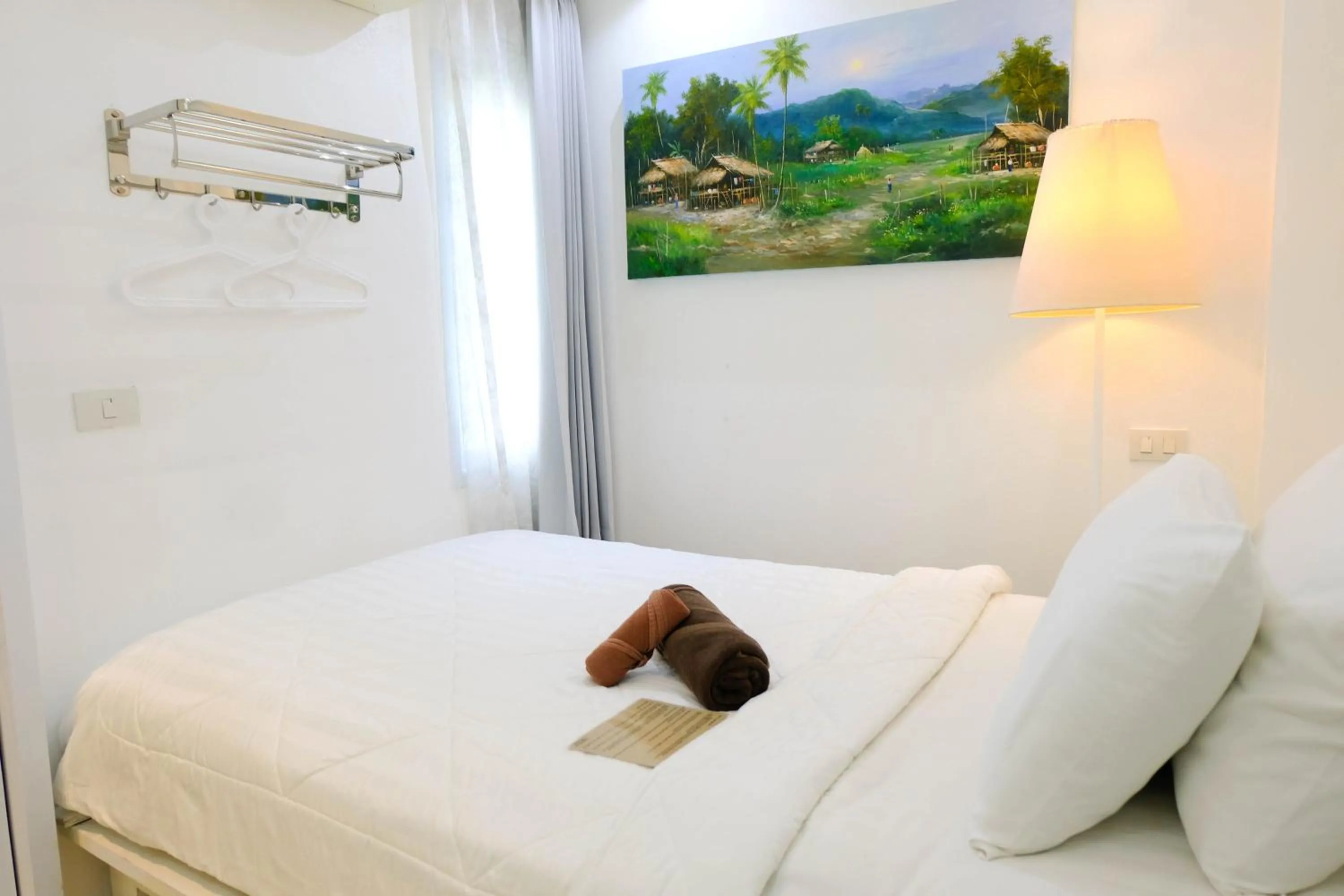 Bed in Baanpoon Apartment