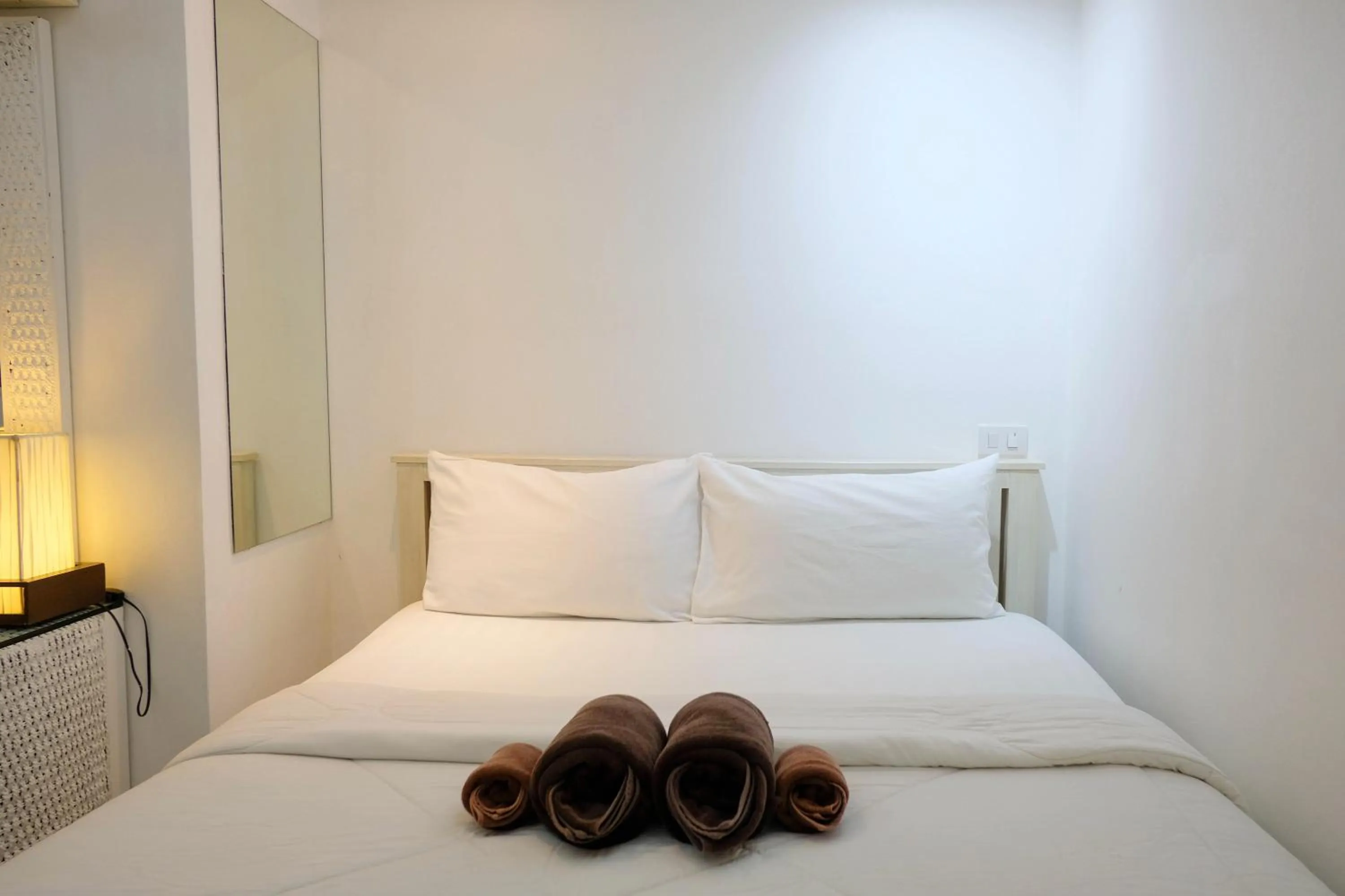 Bed in Baanpoon Apartment