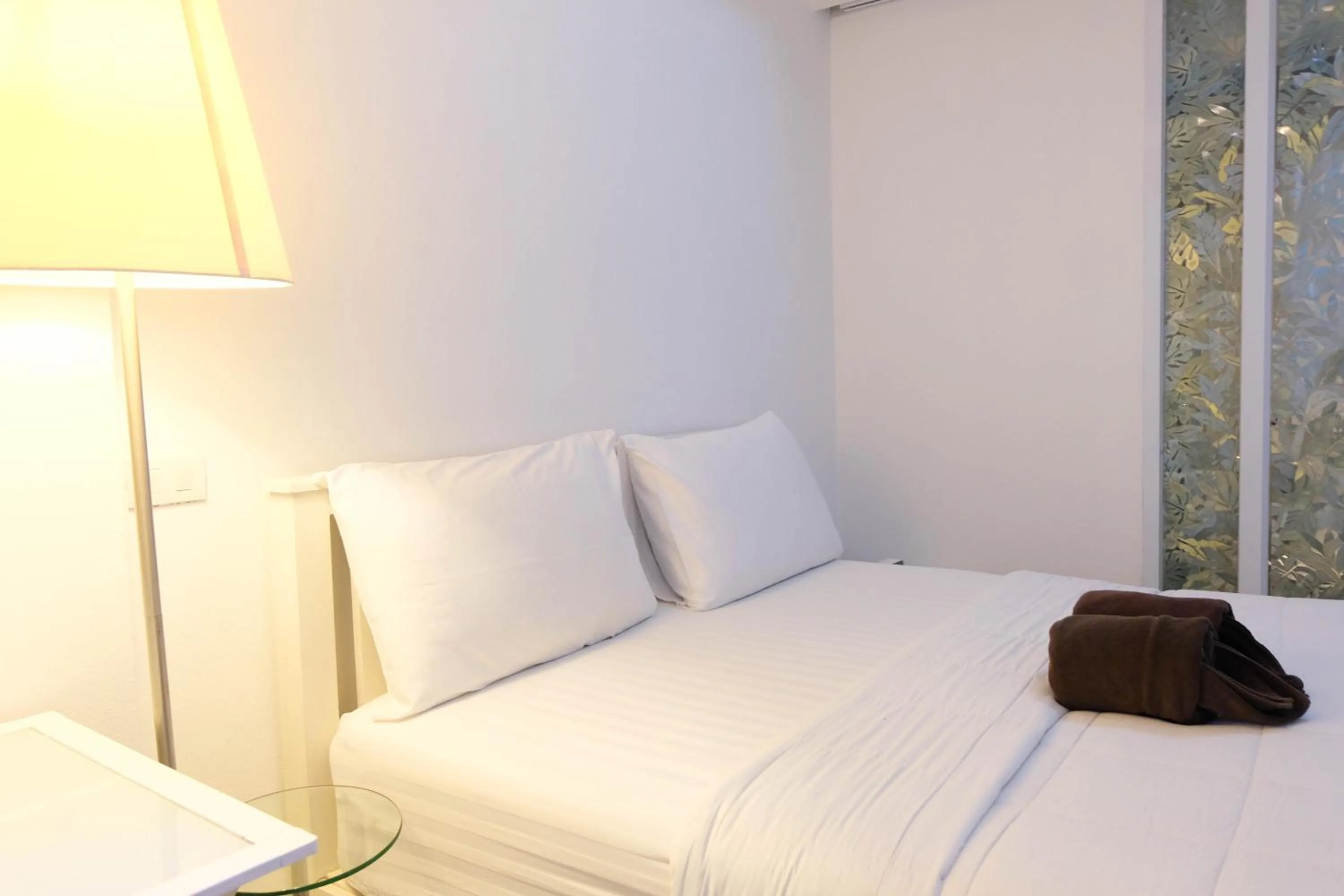 Bed in Baanpoon Apartment