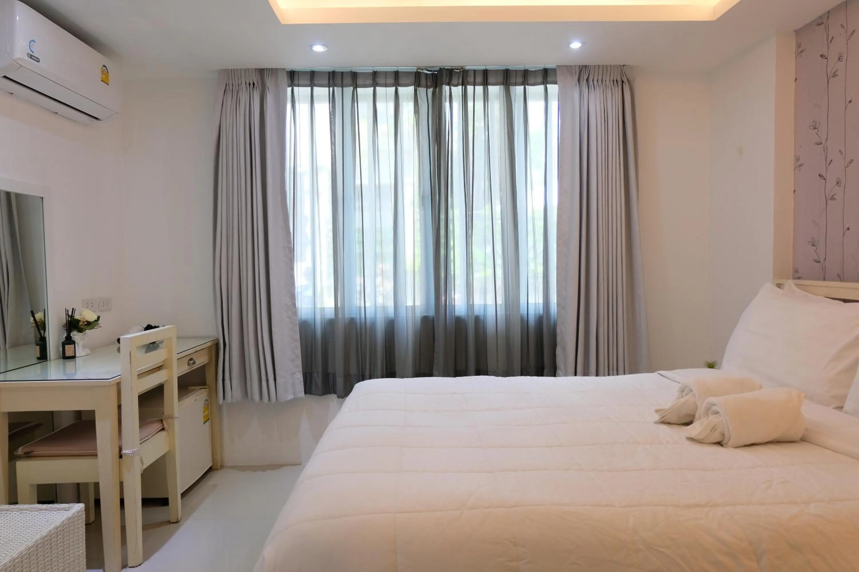 Bed in Baanpoon Apartment