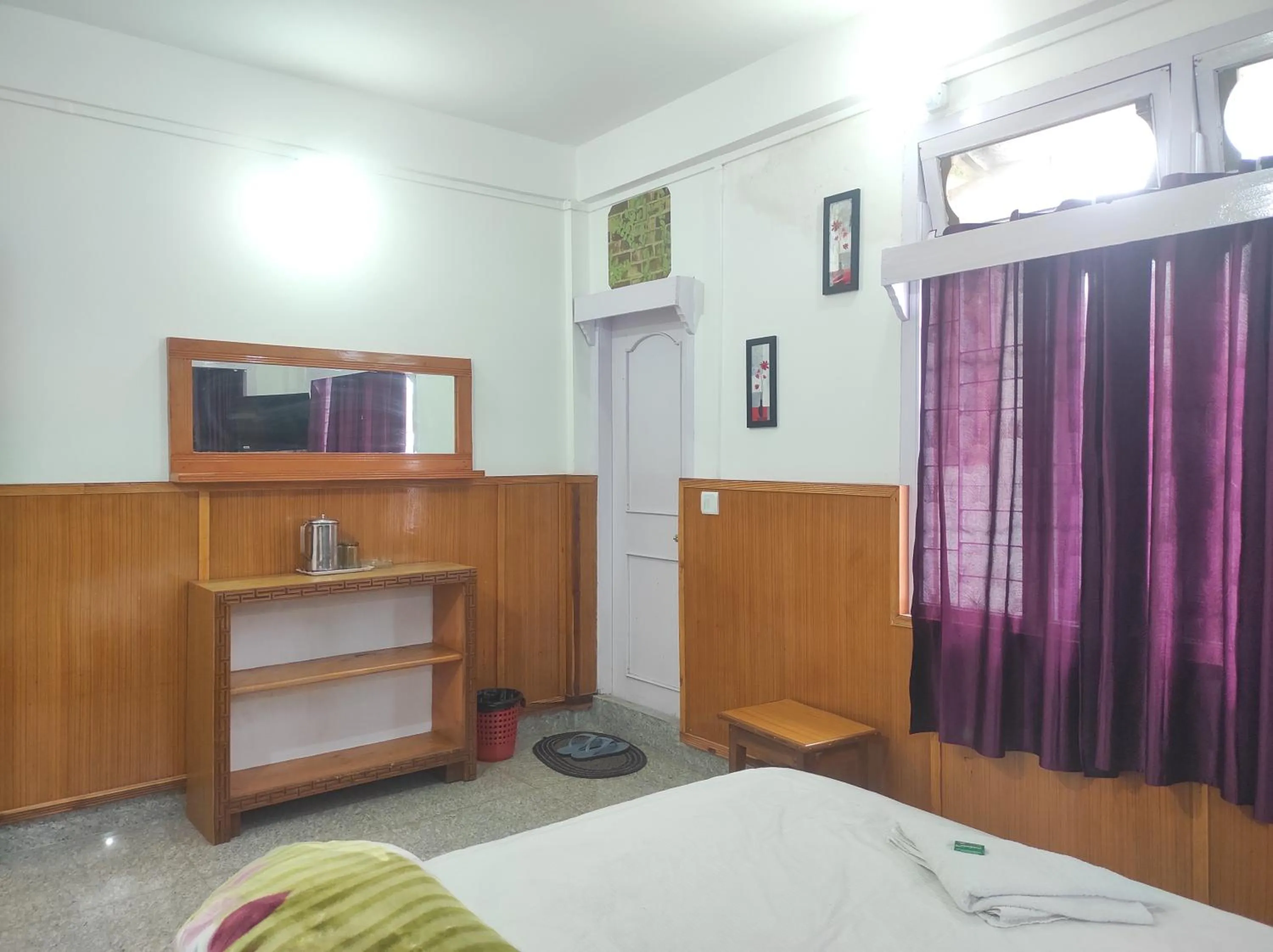 Bed in Hotel Tawang Regency