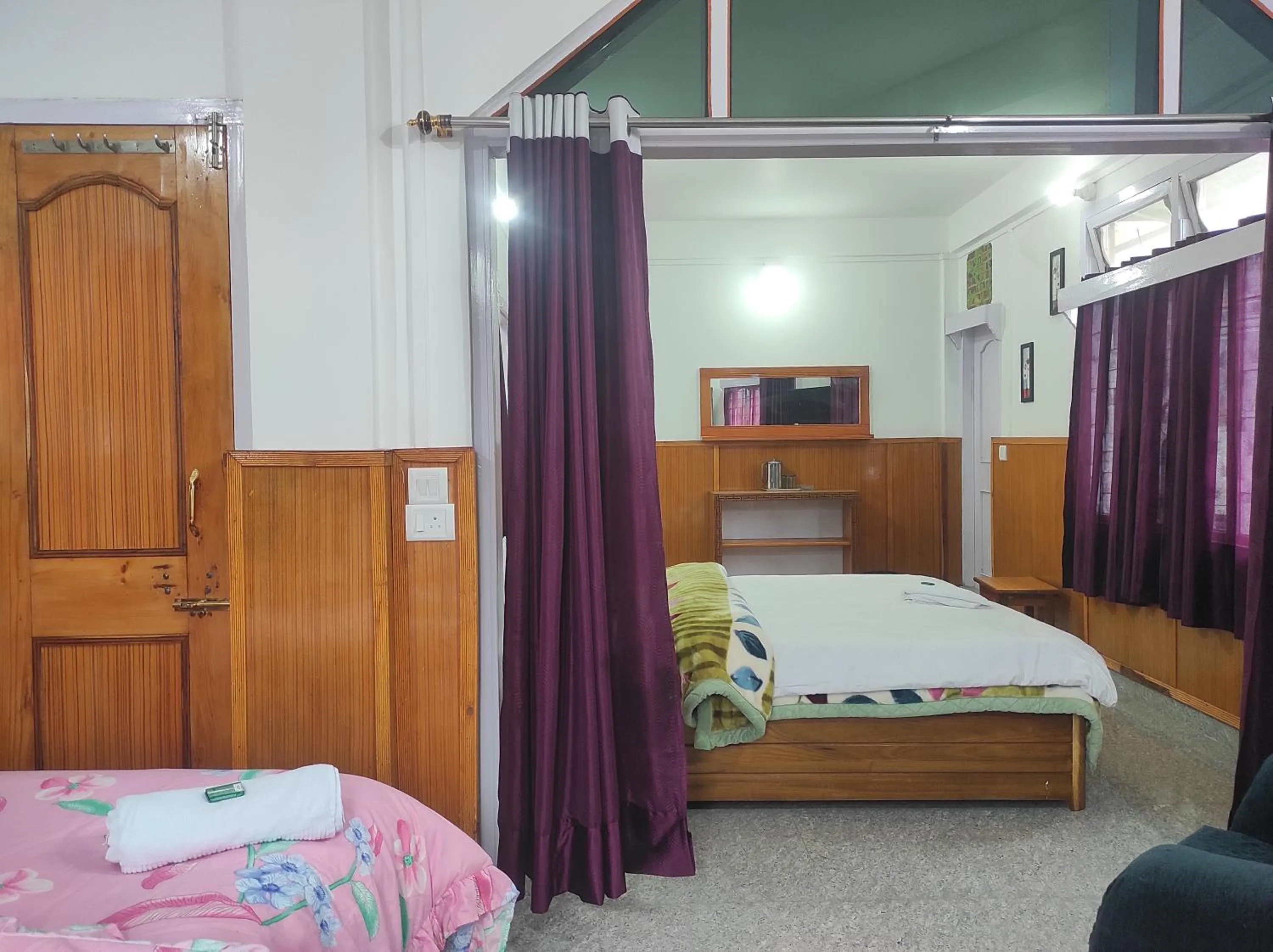 Bed in Hotel Tawang Regency