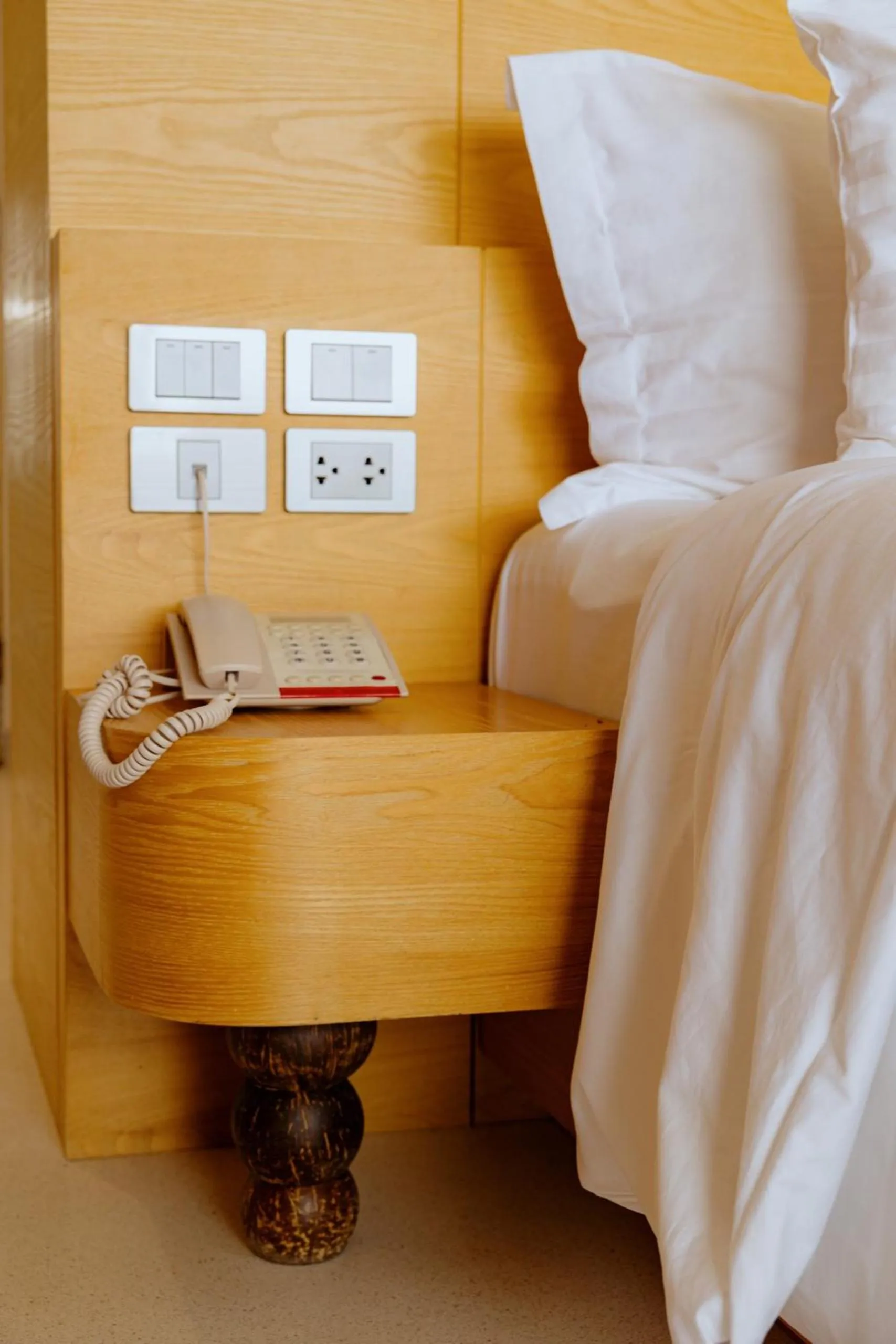 Bed in Elite Atoll Beachfront Hotel