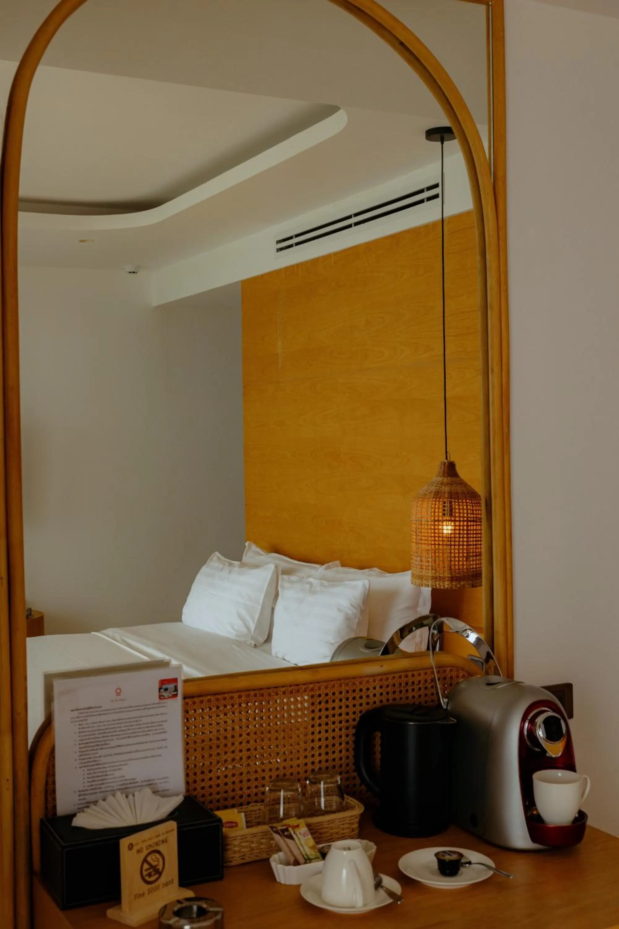 Bed in Elite Atoll Beachfront Hotel