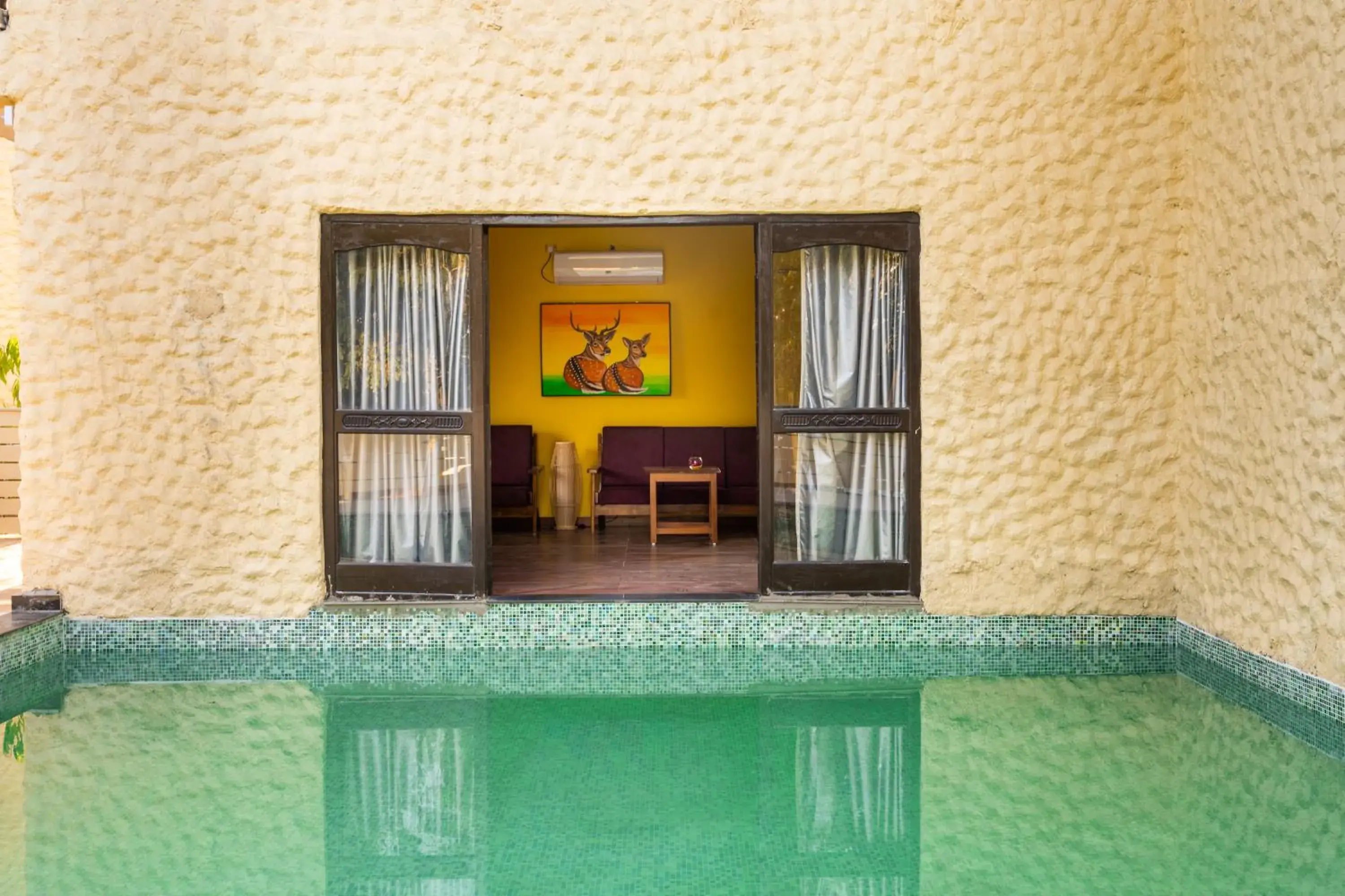 Swimming pool in Citrus Prime Kanha Resort and Villas Swimming pool in Citrus Prime Kanha Resort and Villas